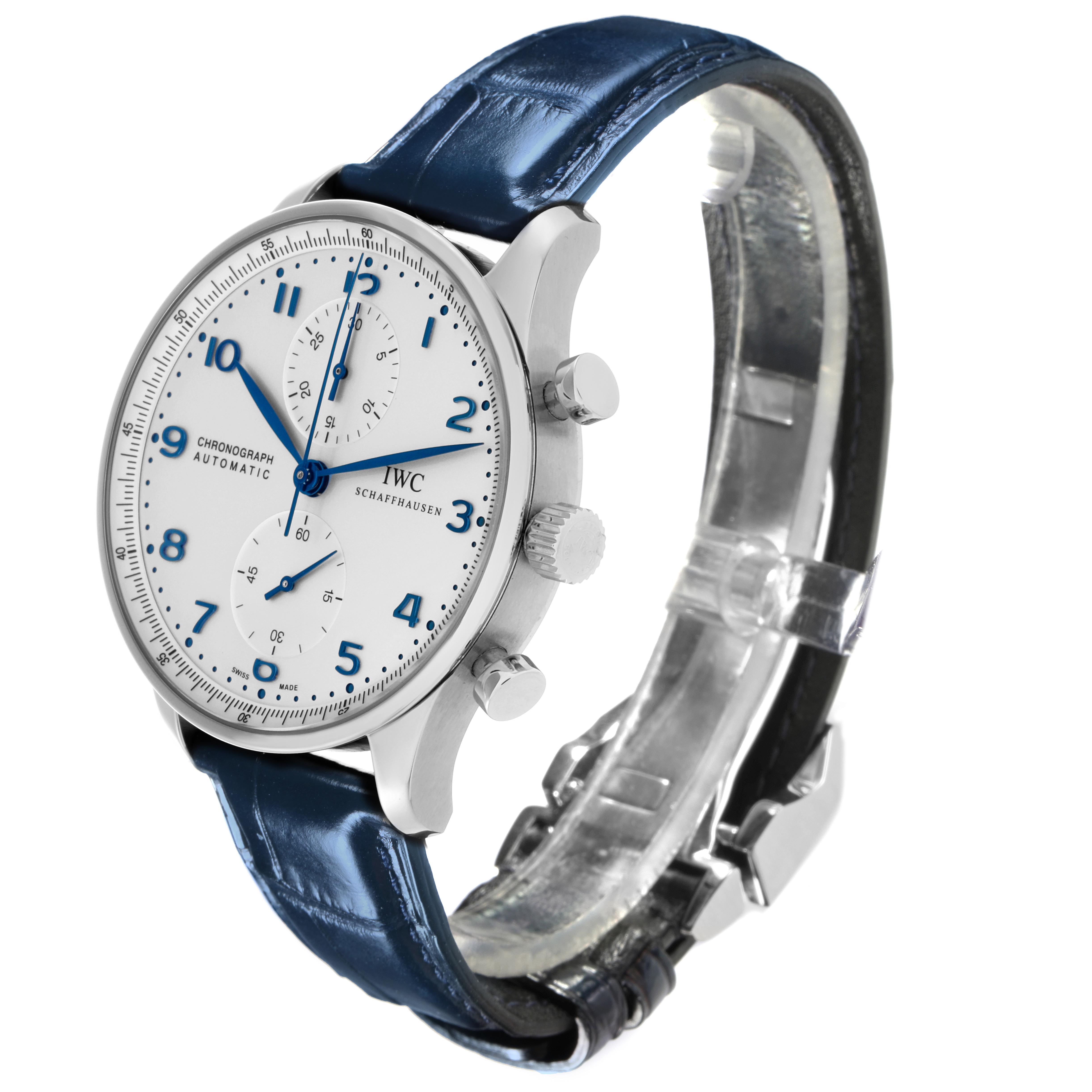The IWC Portuguese IW371446 Men's Stainless Steel Silver Dial IW371446 Men's Stainless Steel Silver Dial watch is shown at a slight angle, highlighting the dial, blue leather strap, and side pushers.