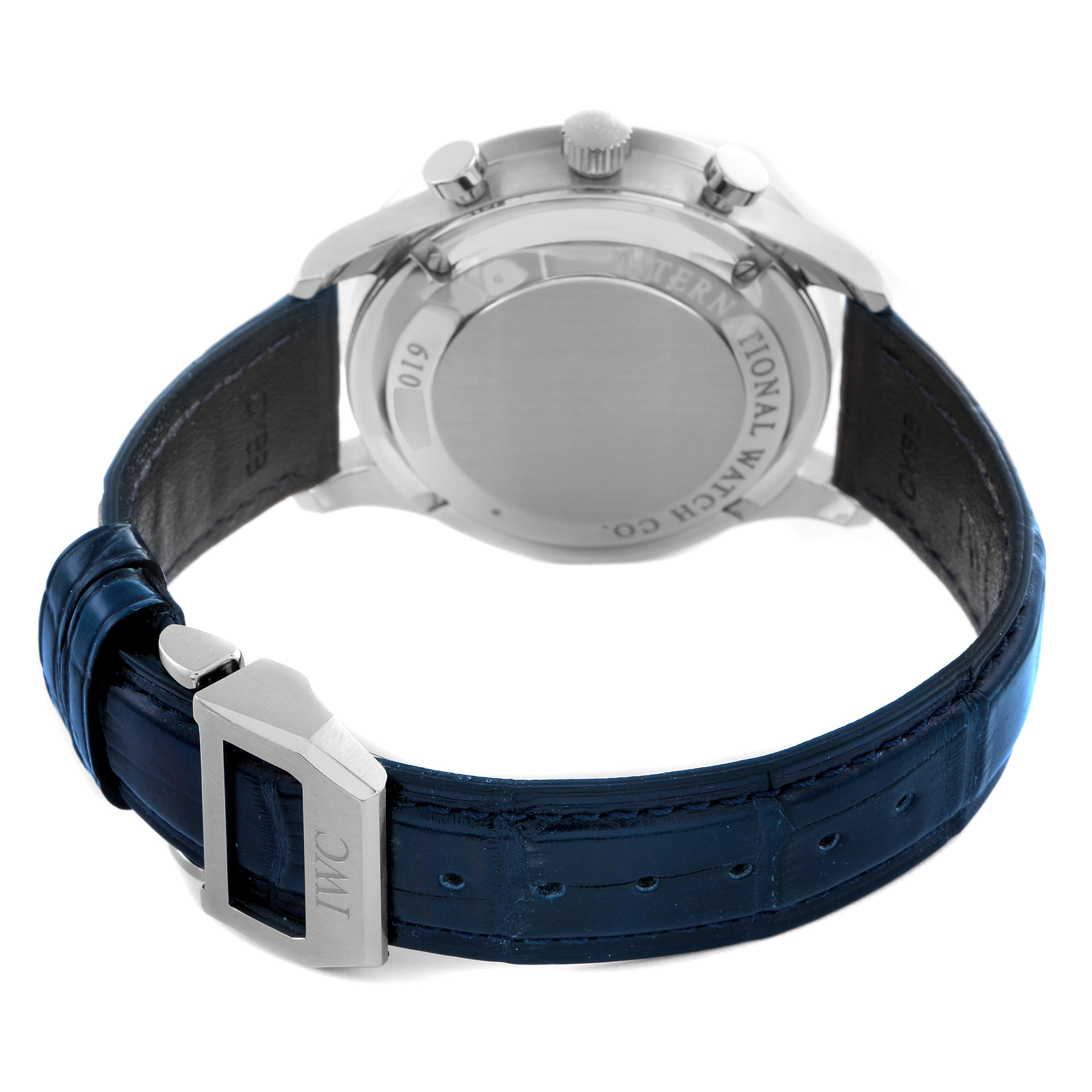 The image shows the back of the IWC Portuguese IW371446 Men's Stainless Steel Silver Dial IW371446 Men's Stainless Steel Silver Dial watch, highlighting the case, crown, and blue leather strap with the IWC clasp.