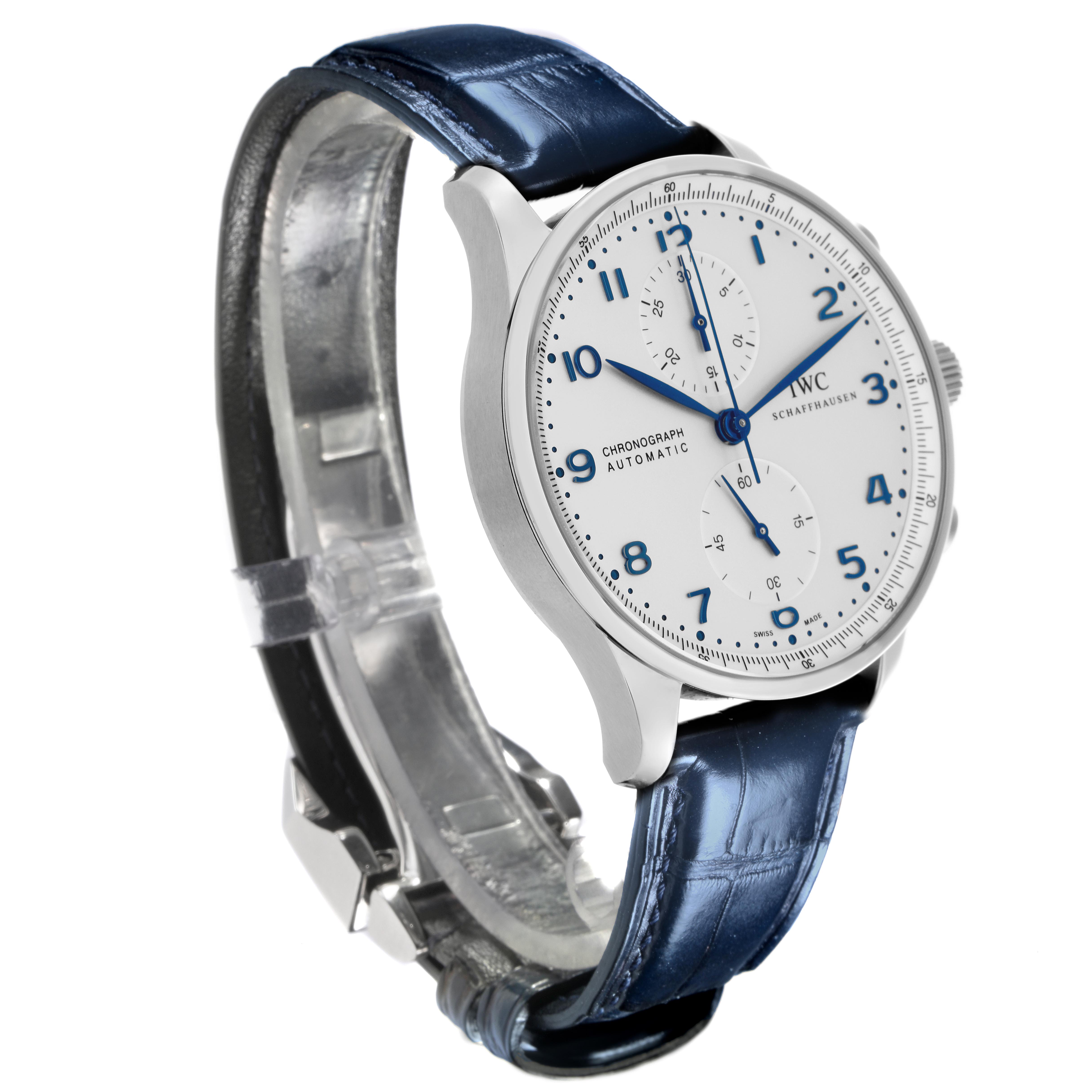 The IWC Portuguese IW371446 Men's Stainless Steel Silver Dial IW371446 Men's Stainless Steel Silver Dial watch is shown from an oblique angle, highlighting the face, case, and blue leather strap.