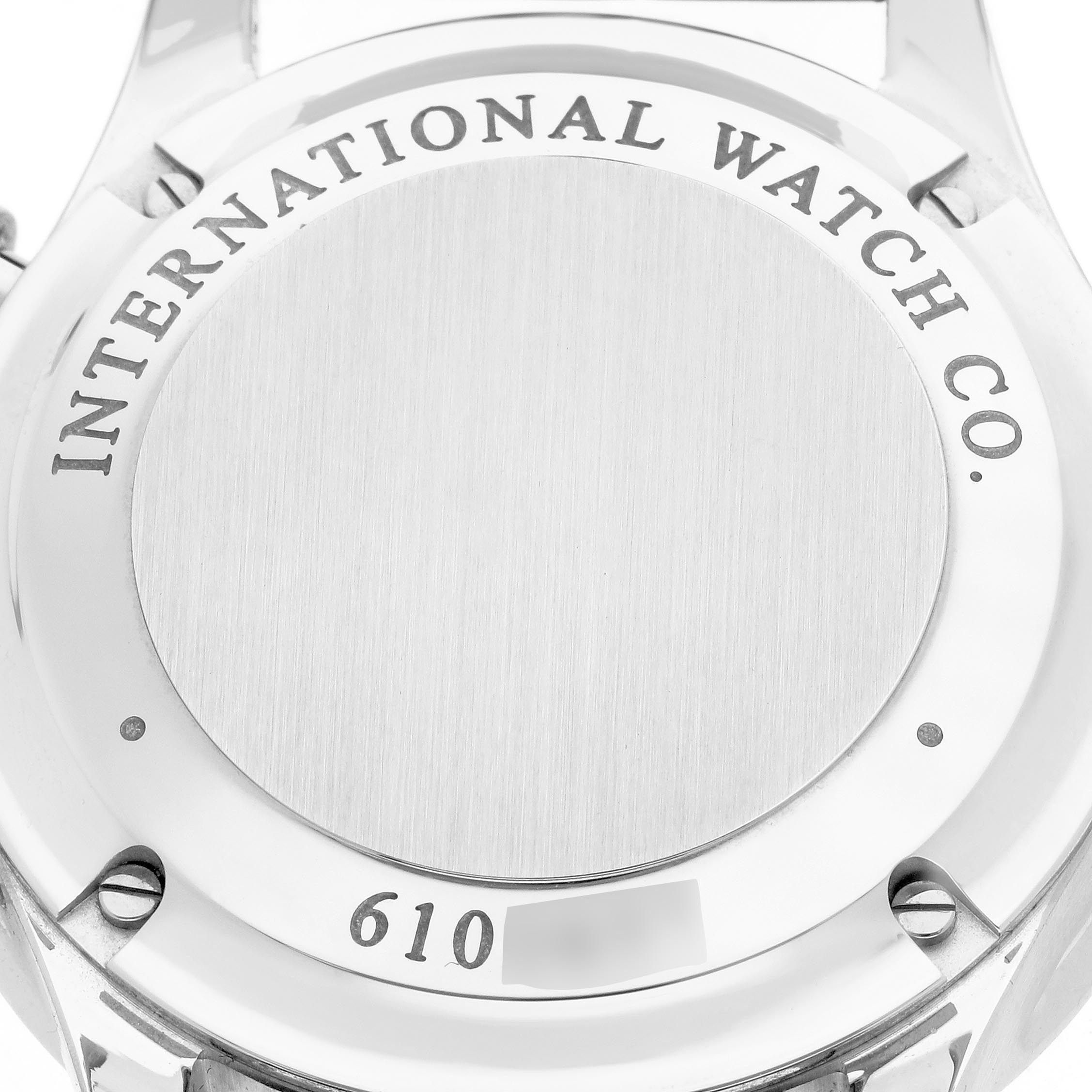The image shows the back case of an IWC Portuguese IW371446 Men's Stainless Steel Silver Dial IW371446 Men's Stainless Steel Silver Dial watch with "INTERNATIONAL WATCH CO." engraved.