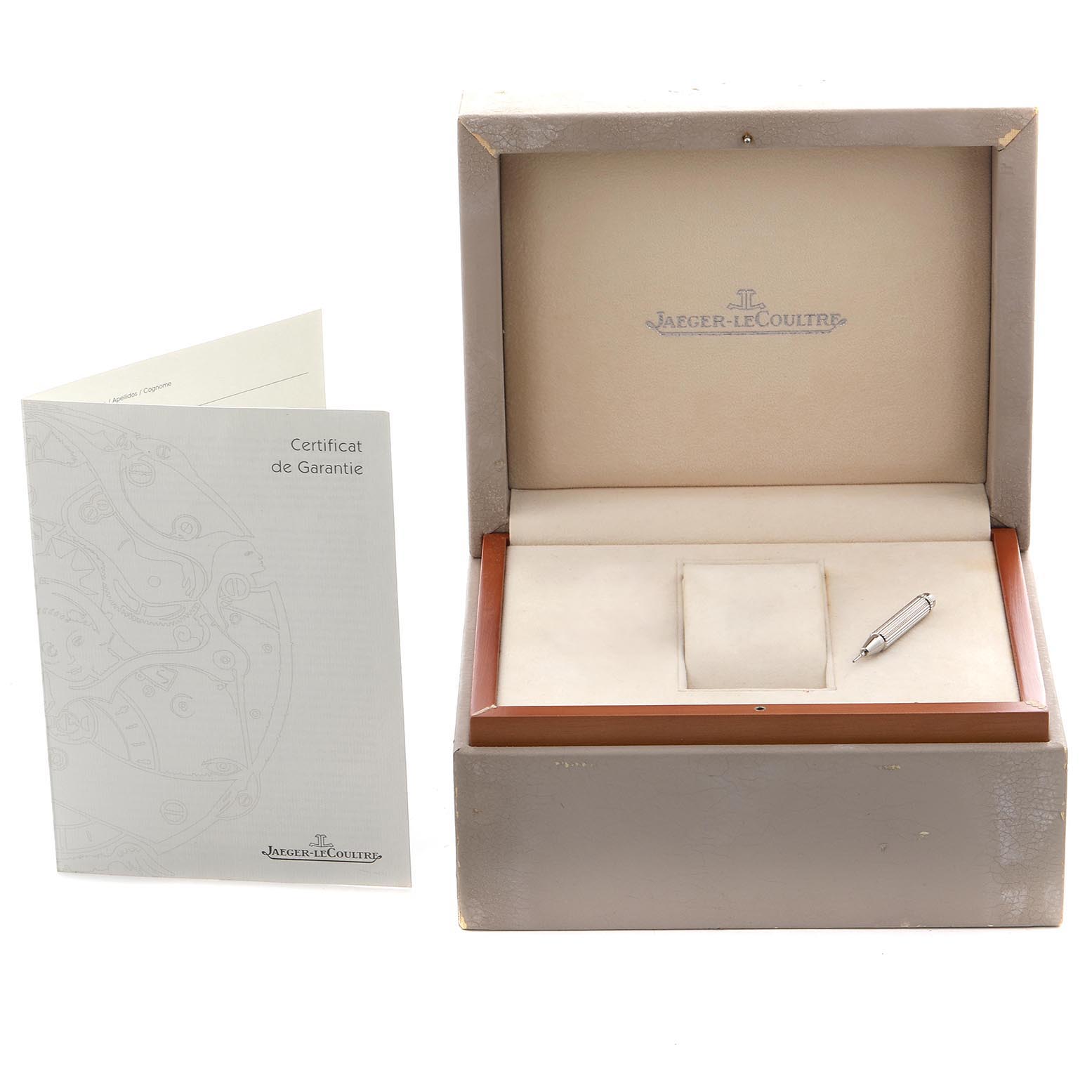 This image shows a Jaeger LeCoultre Reverso Q3028420 Men's Stainless Steel Silver Dial Q3028420 Men's Stainless Steel Silver Dial watch box, warranty certificate, and adjustment tool from a frontal angle.