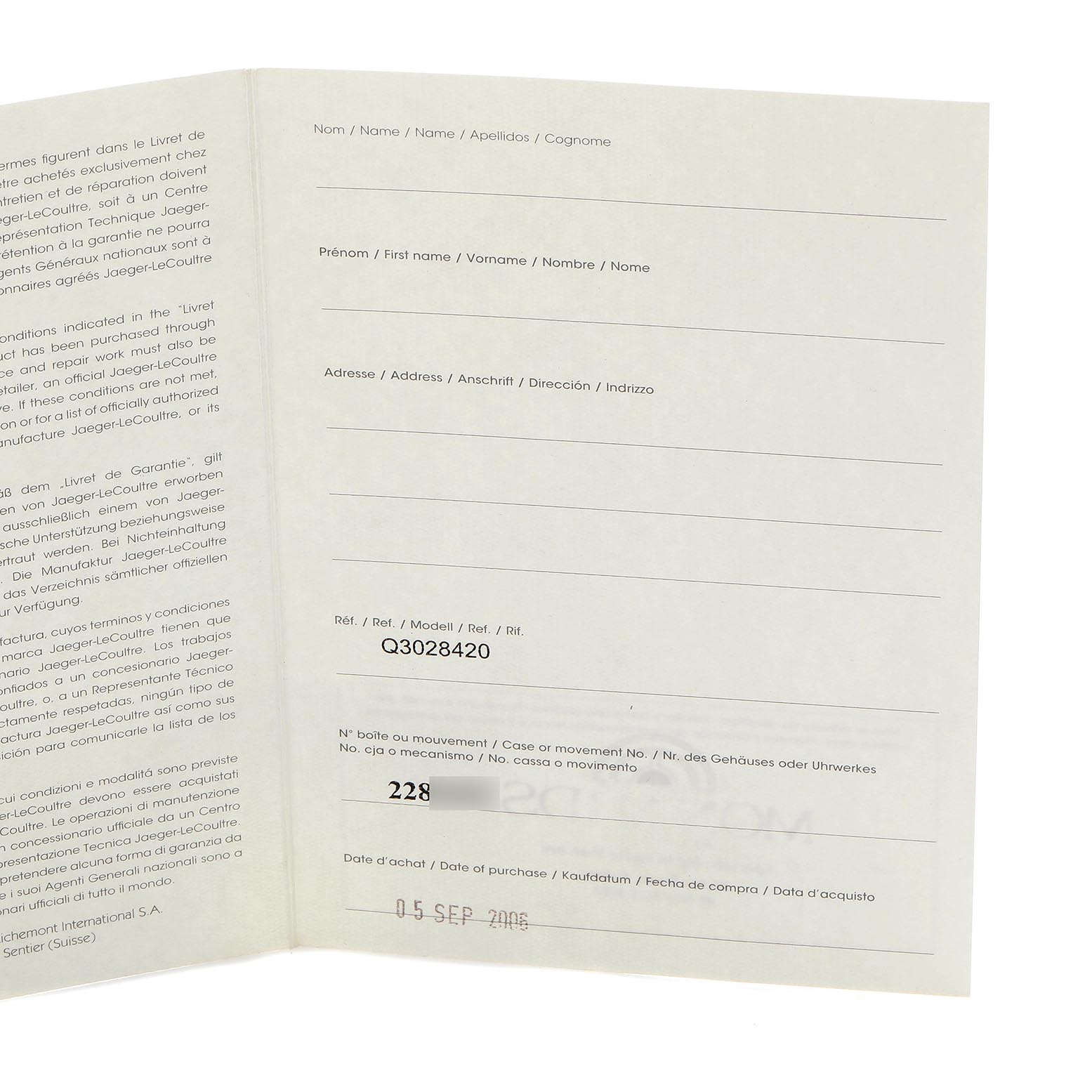 The image shows the warranty booklet for the Jaeger-LeCoultre Reverso watch model at a slight angle, featuring form fields and text.