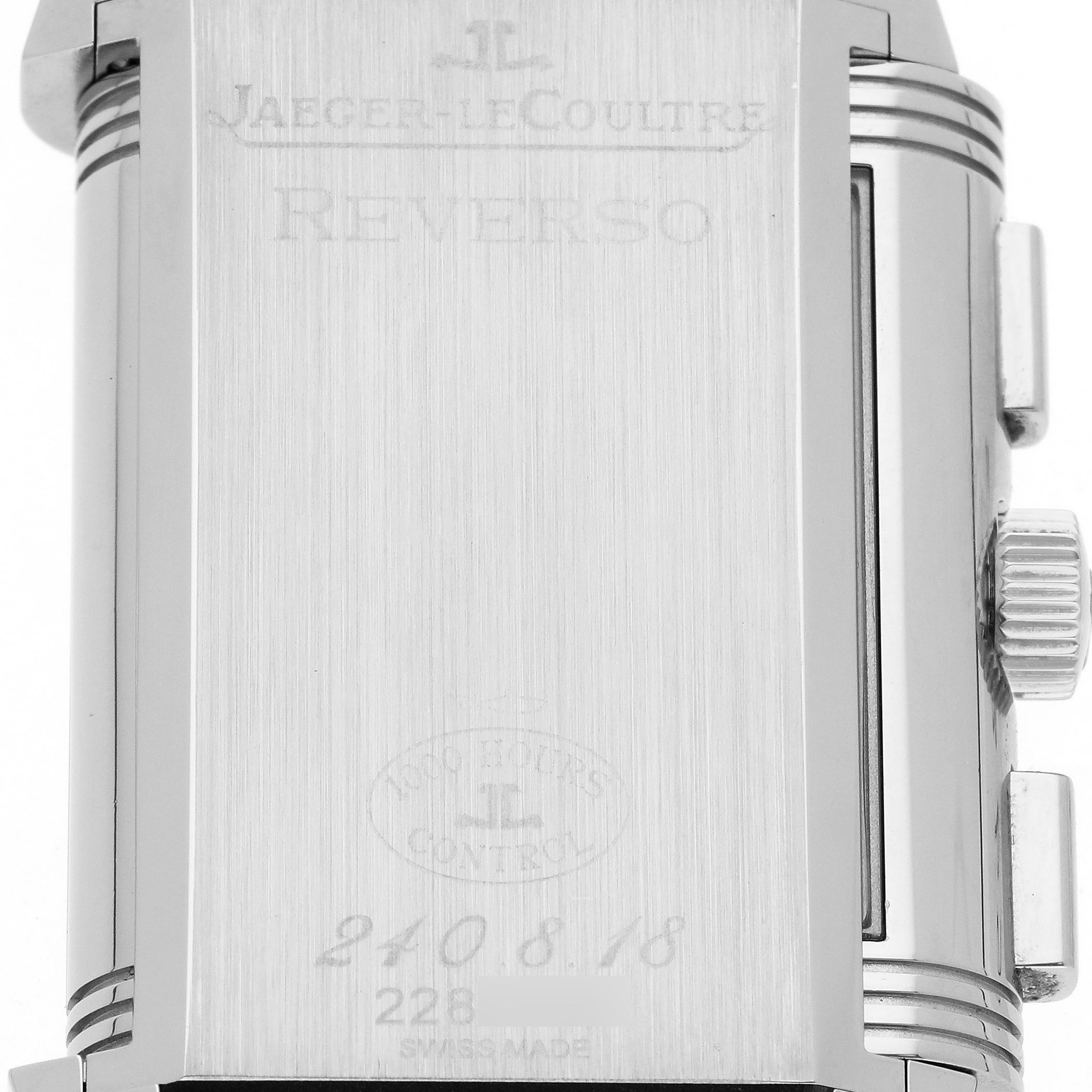 The image shows the back of the Jaeger LeCoultre Reverso Q3028420 Men's Stainless Steel Silver Dial Q3028420 Men's Stainless Steel Silver Dial watch with visible knobs on the side.