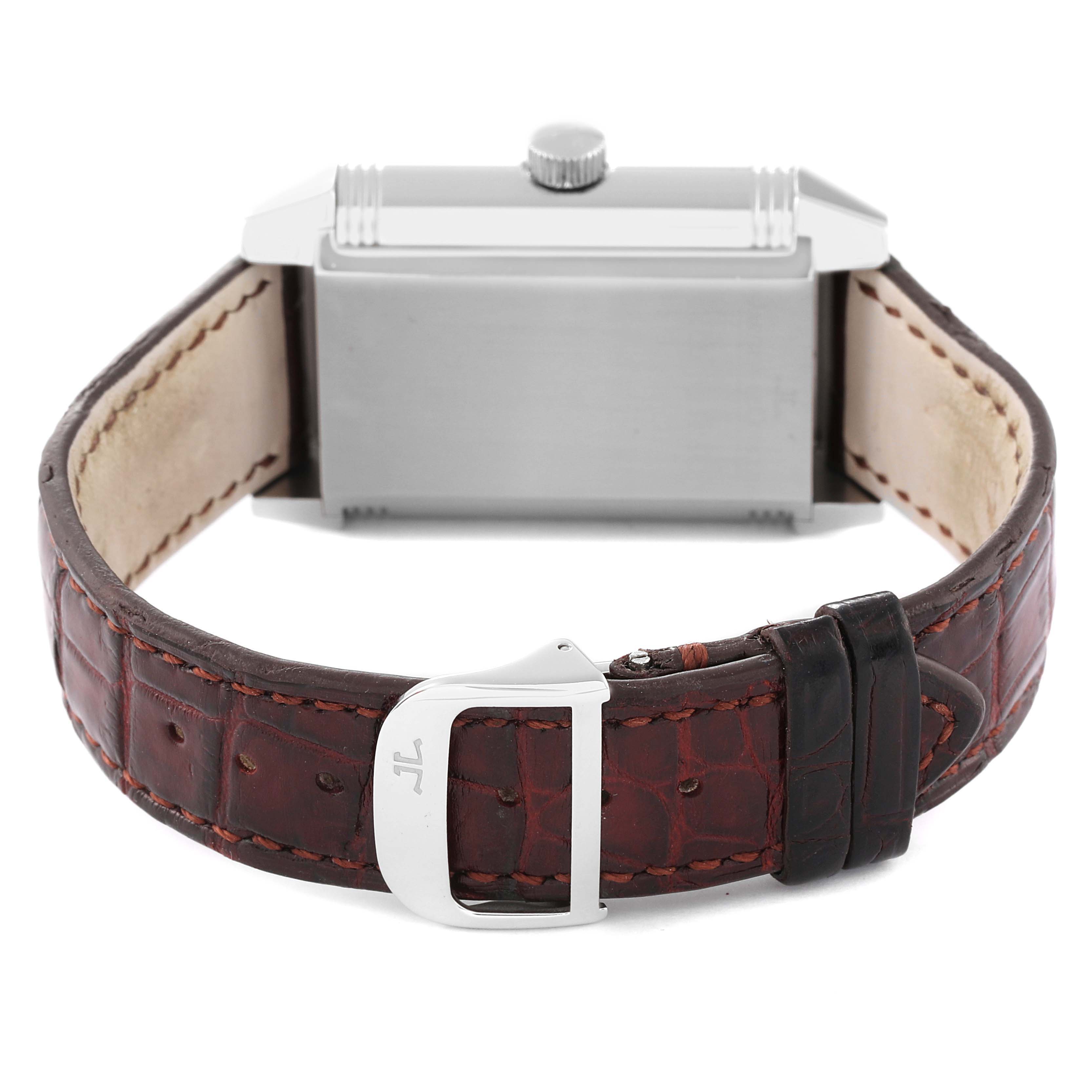 The image shows the back of the Jaeger LeCoultre Reverso Q3018420 Men's Stainless Steel Silver Dial Q3018420 Men's Stainless Steel Silver Dial watch with a brown leather strap and a visible buckle.
