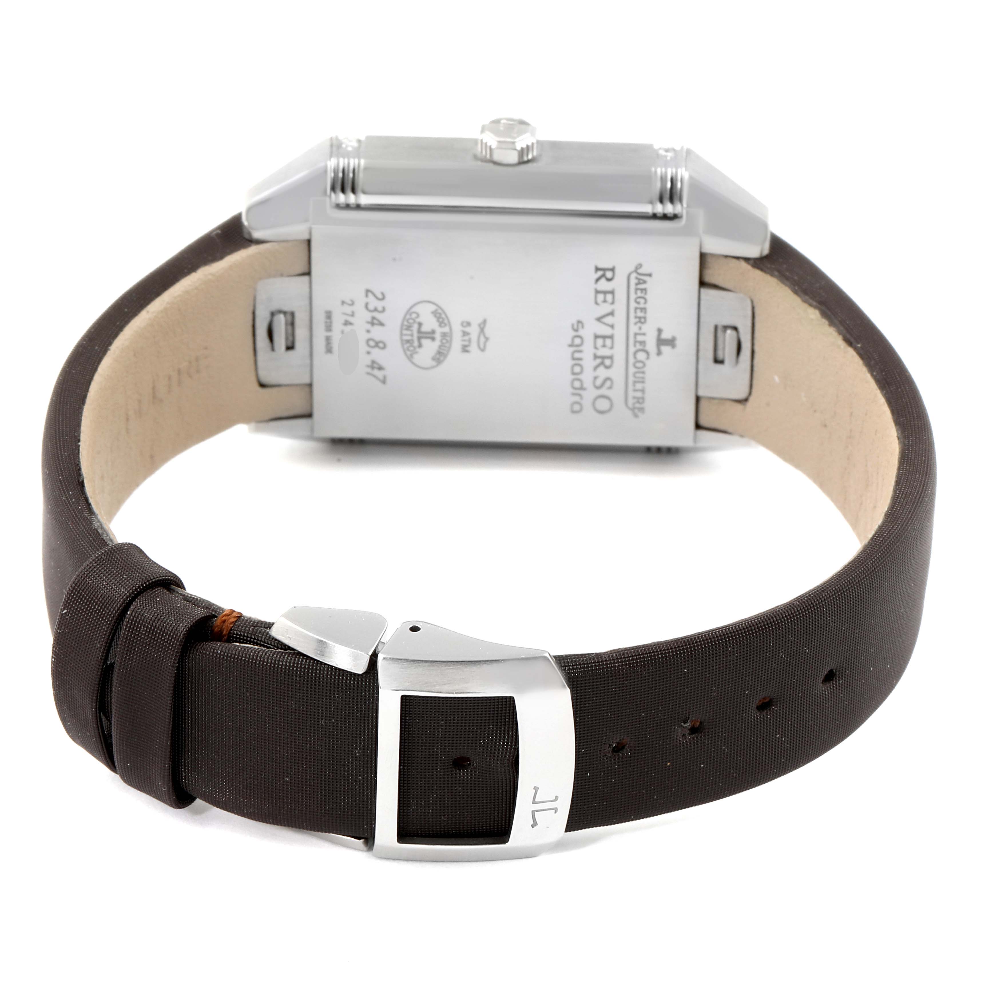 The image shows the reverse side and strap of a Jaeger-LeCoultre Reverso model watch, highlighting the buckle and case back details.