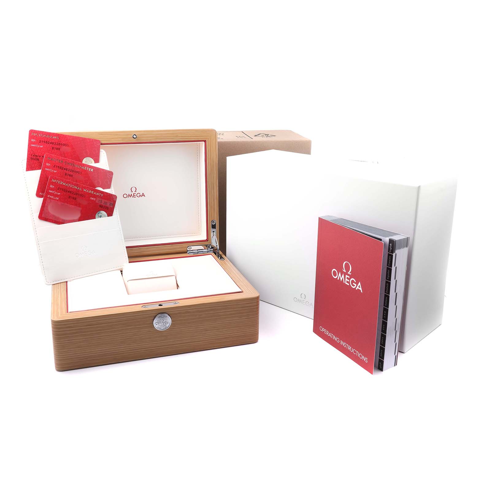 The image shows an Omega Planet Ocean 215.92.46.22.01.001 Men's Ceramic Black Dial watch box, warranty cards, instruction manual, and outer packaging at a slight angle.