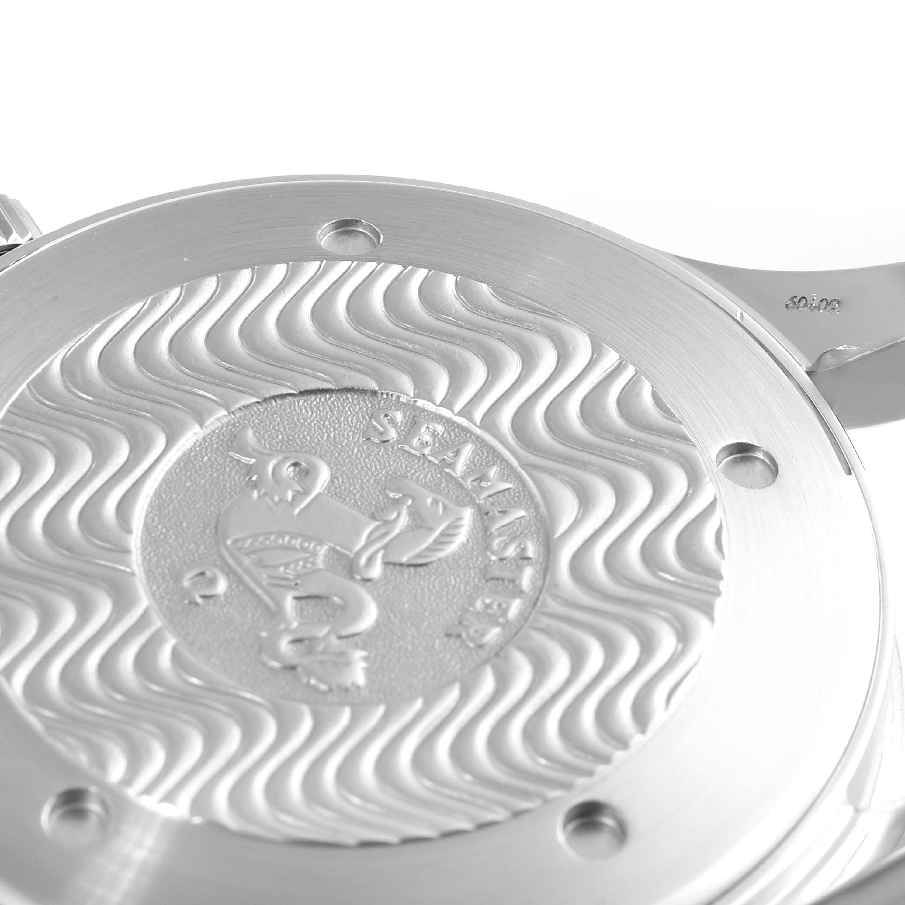 The image shows the back case of an Omega Seamaster 2531.80.00 Men's Stainless Steel Blue Dial 2531.80.00 Men's Stainless Steel Blue Dial watch, featuring its engraved emblem and wave pattern.