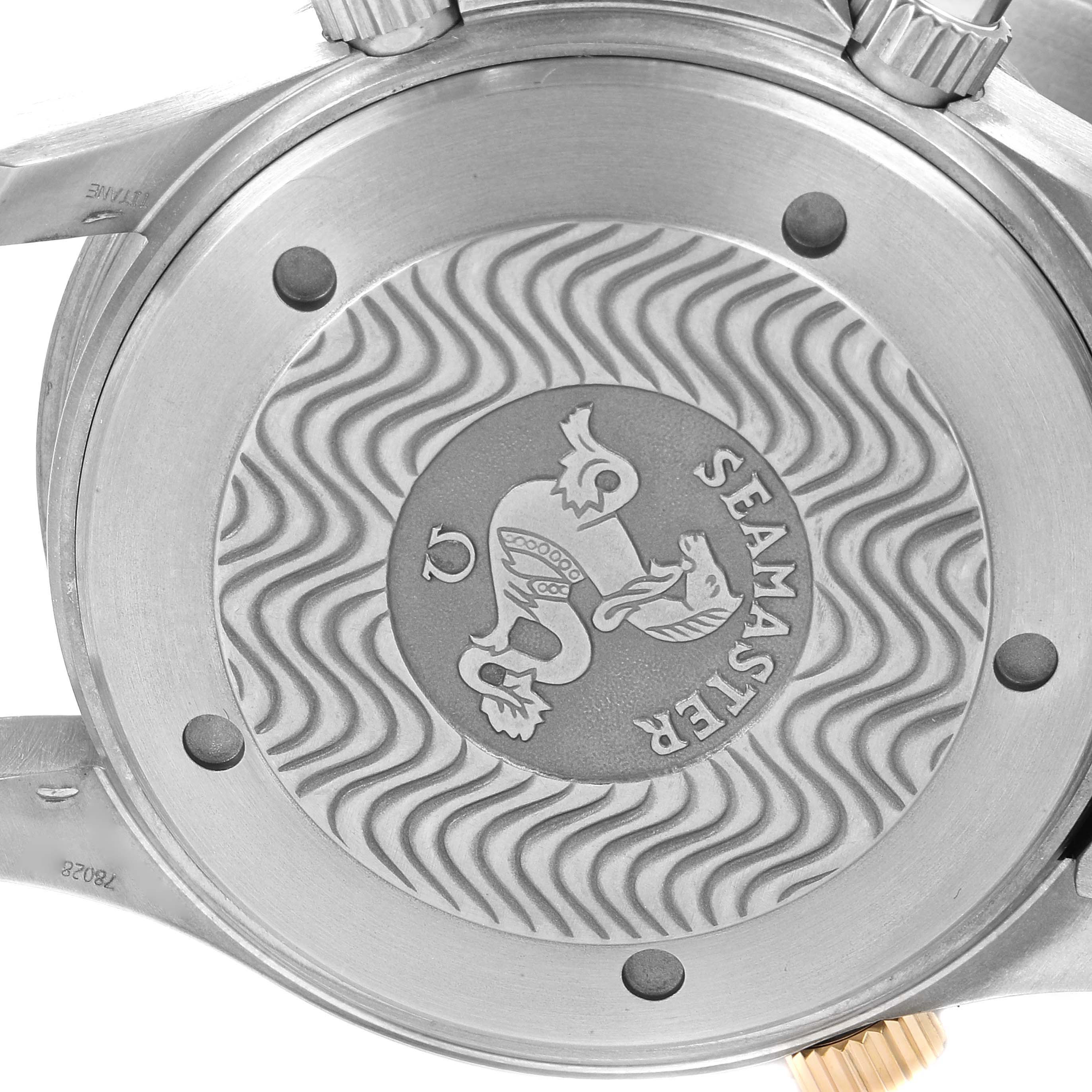 This image shows the case back of an Omega Seamaster 2294.50.00 Men's Titanium Black Dial 2294.50.00 Men's Titanium Black Dial watch with its engraved logo and wavy pattern.