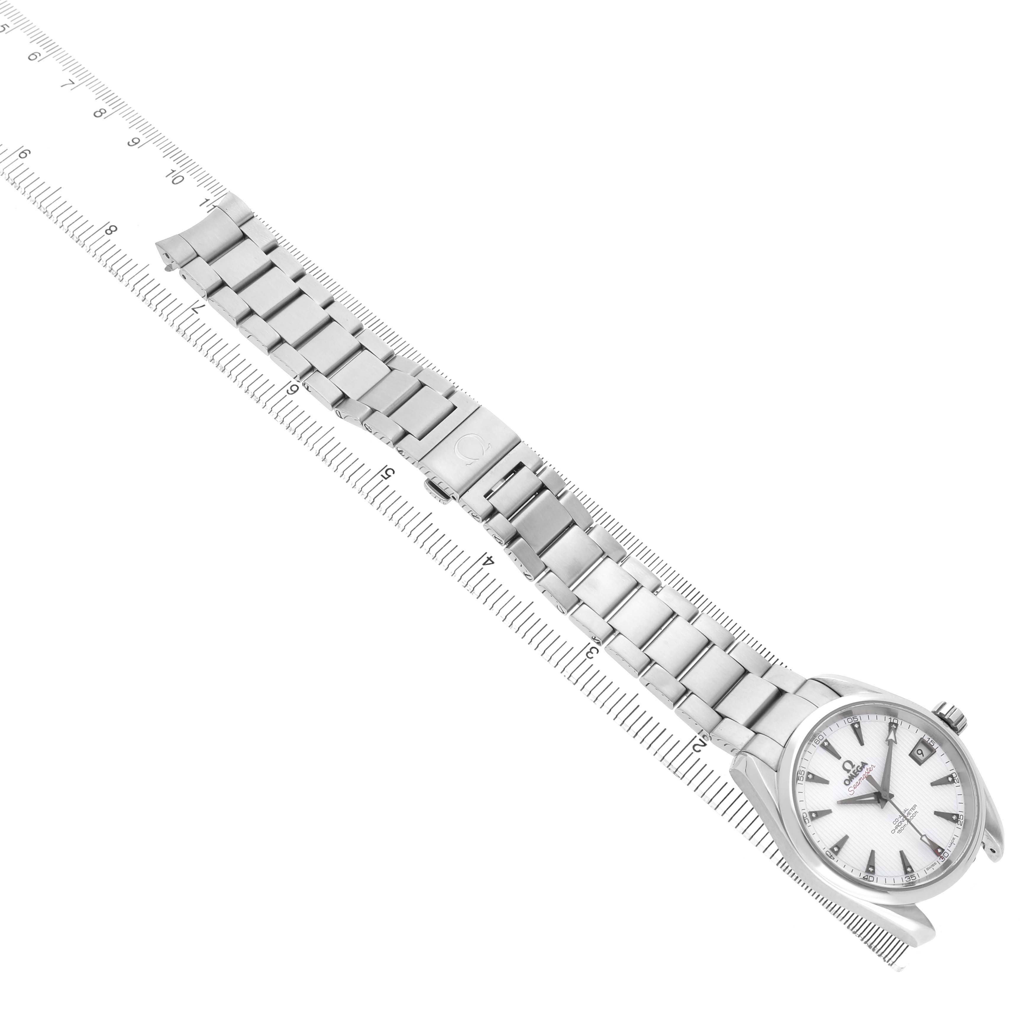 The Omega Aqua Terra 231.10.39.21.54.001 Men's Stainless Steel White Dial watch is shown from a top angle, featuring the bracelet, clasp, and dial against a ruler for size reference.