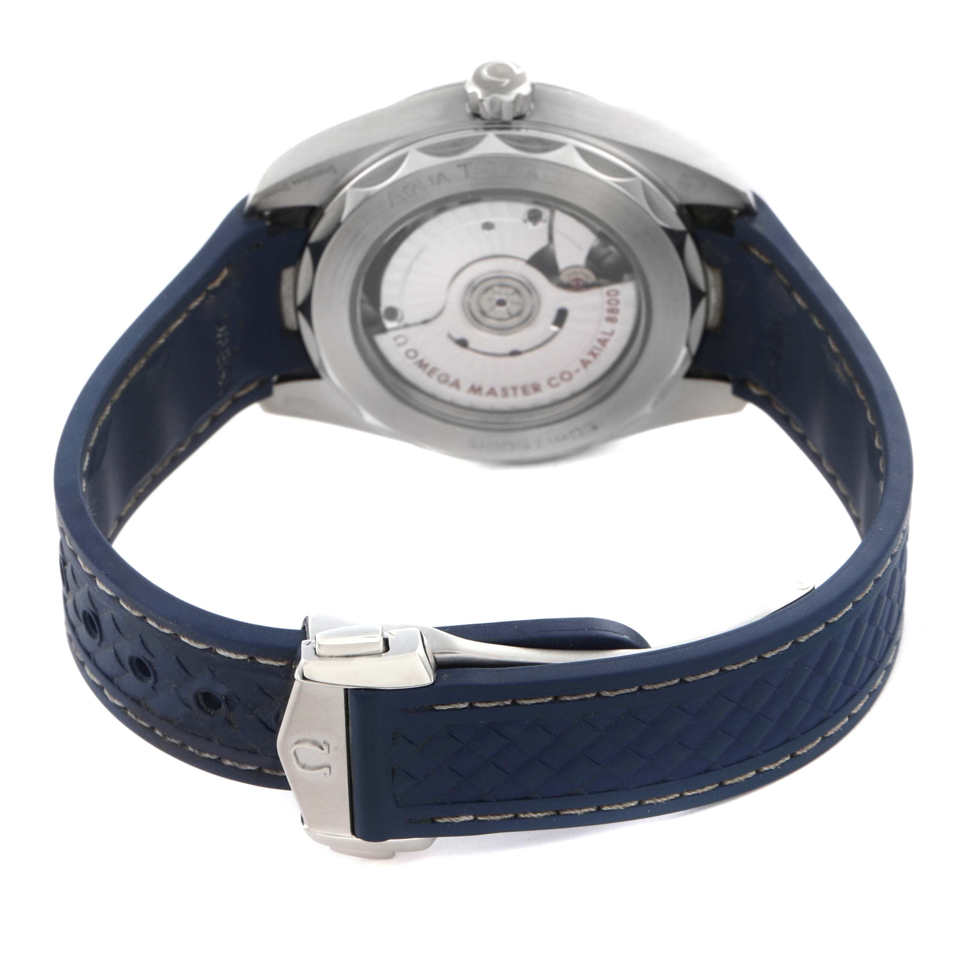 The Omega Aqua Terra 220.12.38.20.03.001 Men's Stainless Steel Blue Dial 220.12.38.20.03.001 Men's Stainless Steel Blue Dial watch is shown from the back, displaying its movement and blue strap with a clasp.