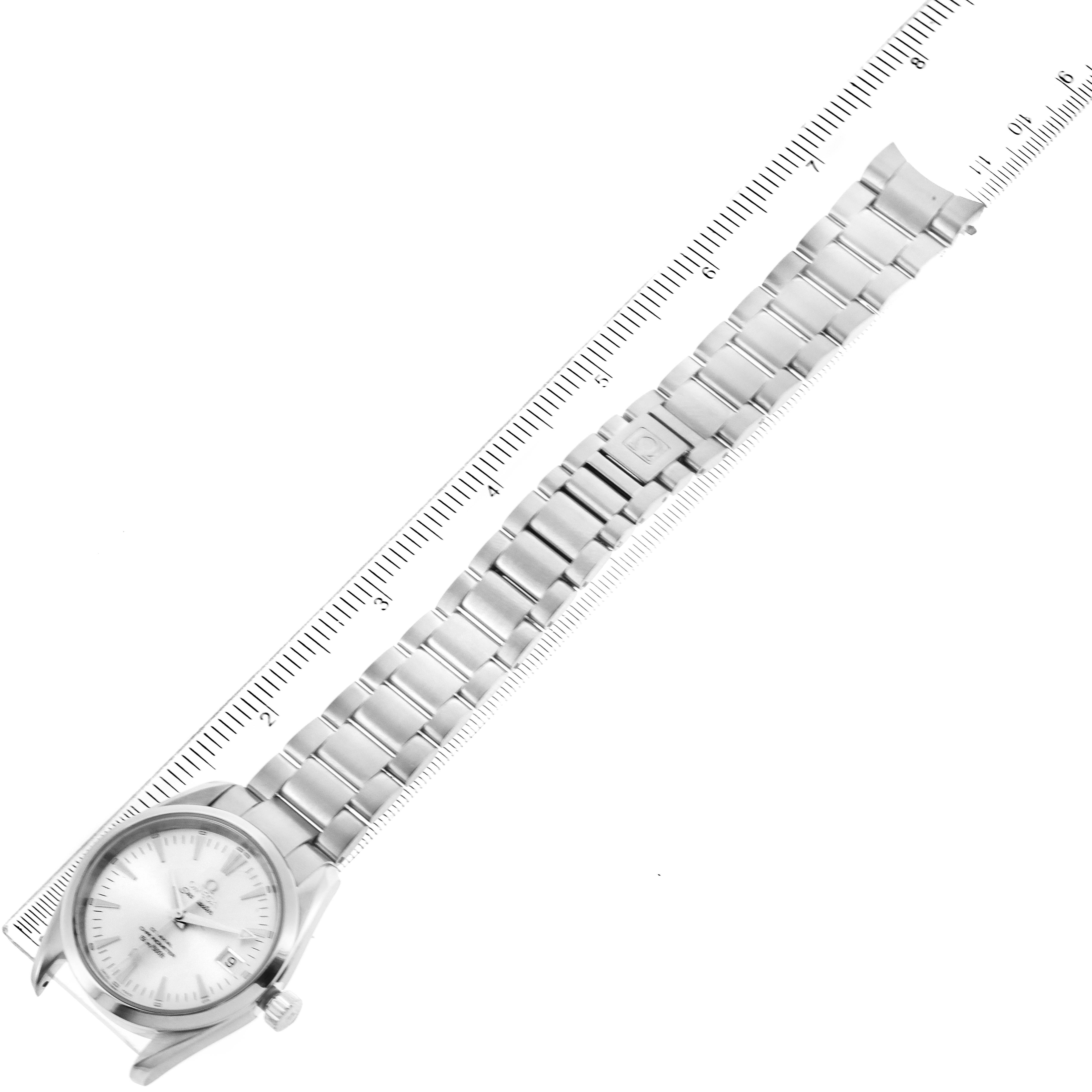 The Omega Aqua Terra 2503.30.00 Men
s Stainless Steel Silver Dial 2503.30.00 Men
s Stainless Steel Silver Dial watch is shown from a top-down angle with the ruler measuring its metal band.