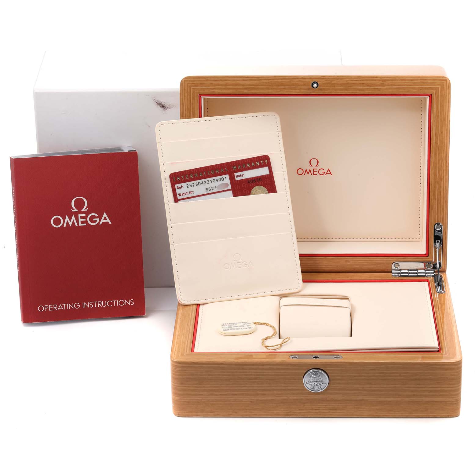 The image shows the packaging accessories for an Omega Planet Ocean 232.30.42.21.04.001 Men's Stainless Steel White Dial 232.30.42.21.04.001 Men's Stainless Steel White Dial watch, including a wooden box, instructions, and warranty card.