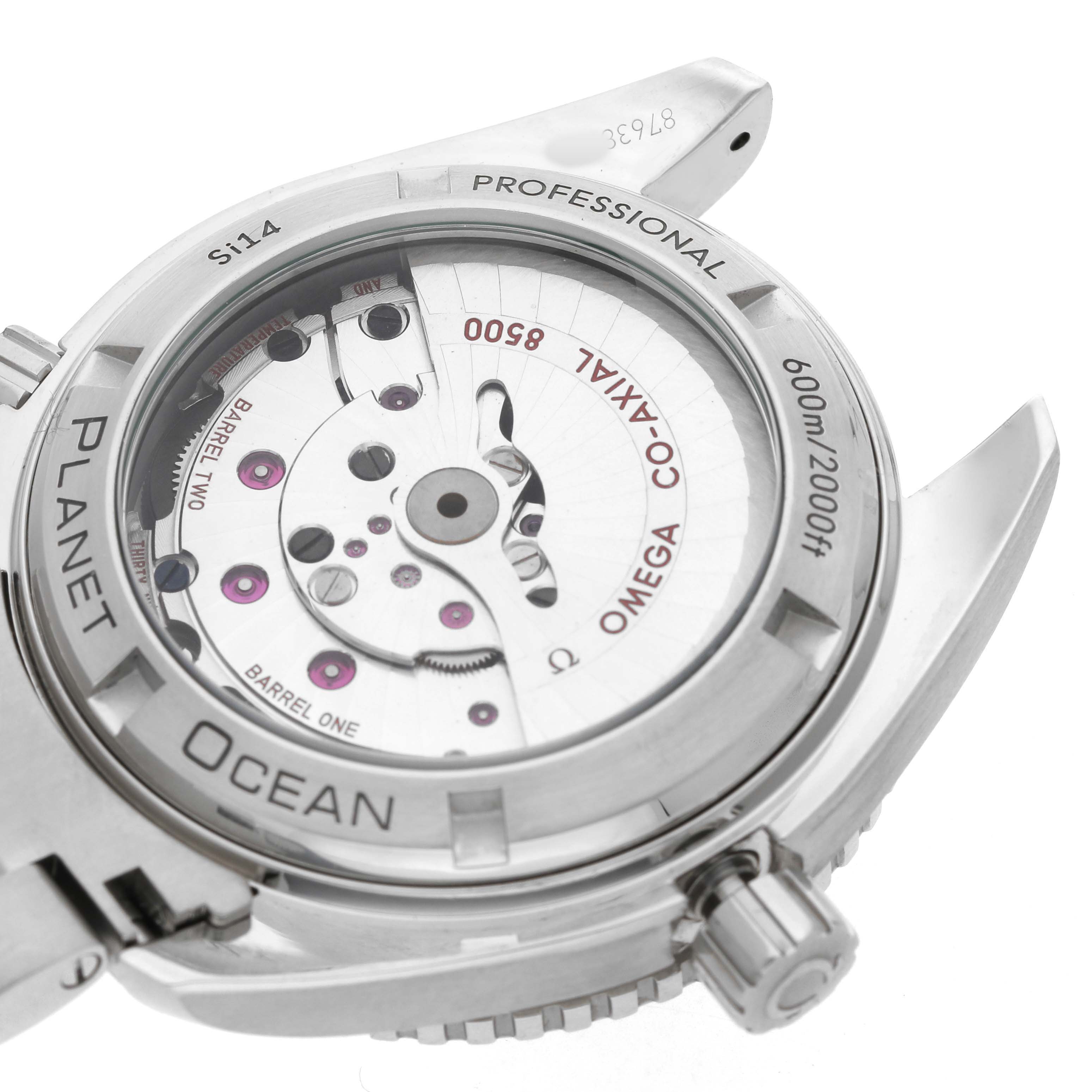 The image shows the back of an Omega Seamaster 232.30.42.21.01.003 Men's Stainless Steel Black Dial watch, revealing its Co-Axial movement and case details.