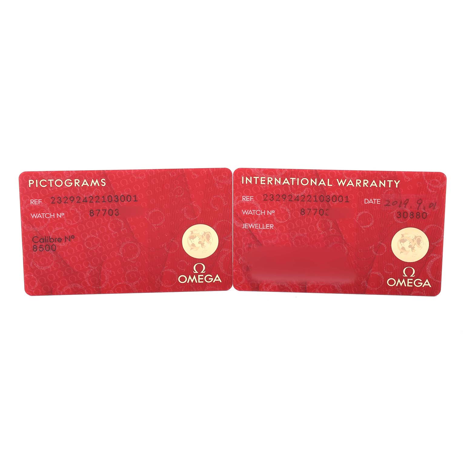 The image shows Omega Seamaster 232.92.42.21.03.001 Men's Titanium Blue Dial model cards for "Pictograms" and "International Warranty" at a flat angle.