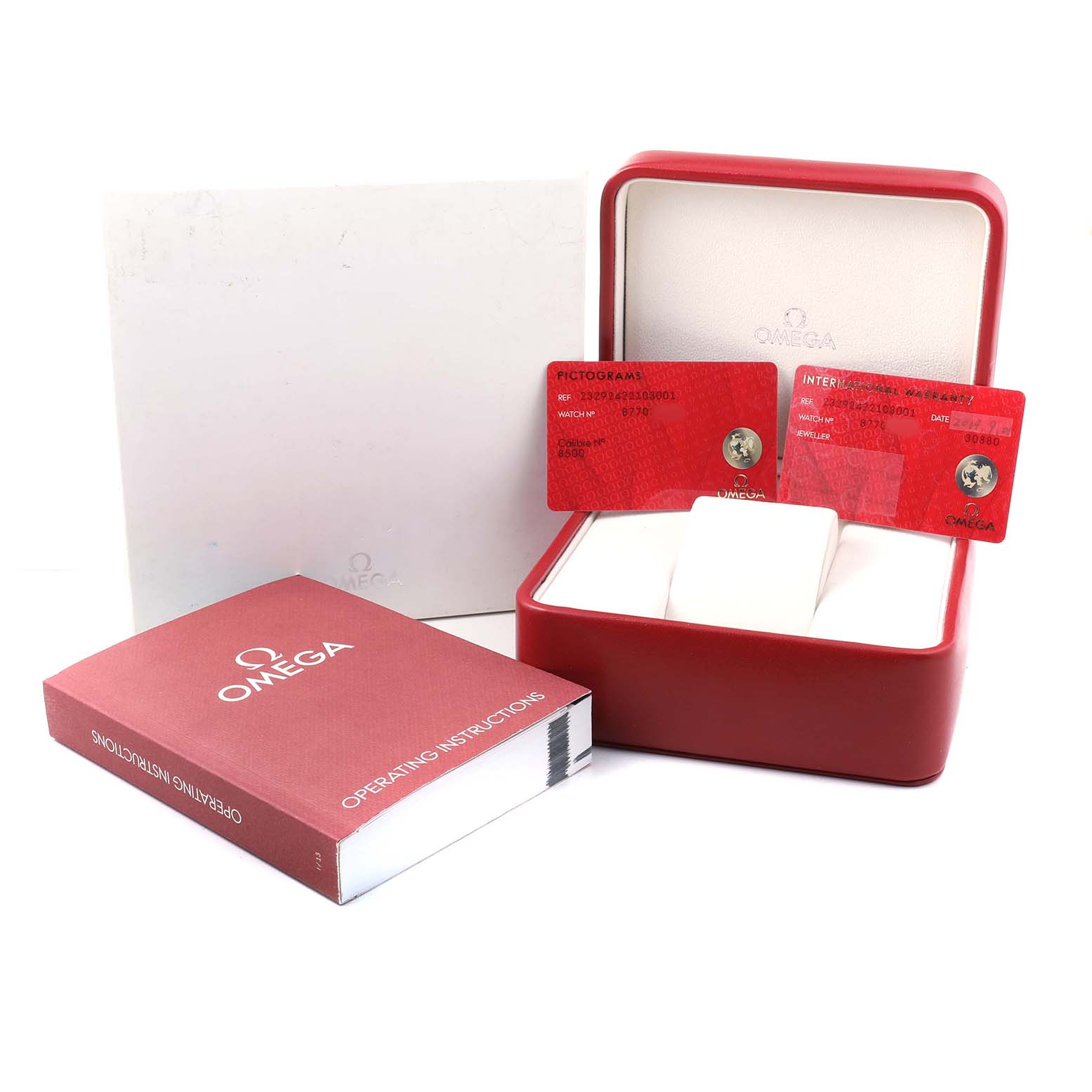 The image shows a Seamaster by Omega packaging, including the box, warranty cards, and manual, viewed from a front angle.