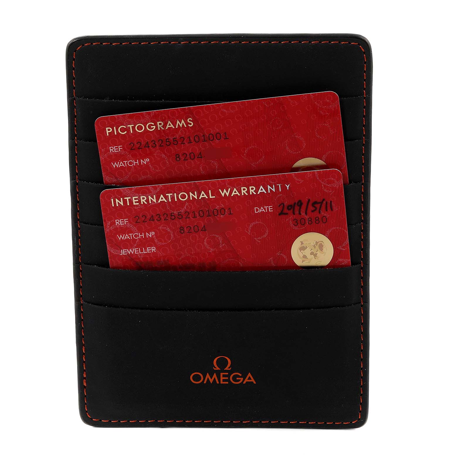 The image shows an Omega Ploprof 224.32.55.21.01.001 Men's Stainless Steel Black Dial 224.32.55.21.01.001 Men's Stainless Steel Black Dial model warranty card holder with two red cards labeled "PICTOGRAMS" and "INTERNATIONAL WARRANTY."