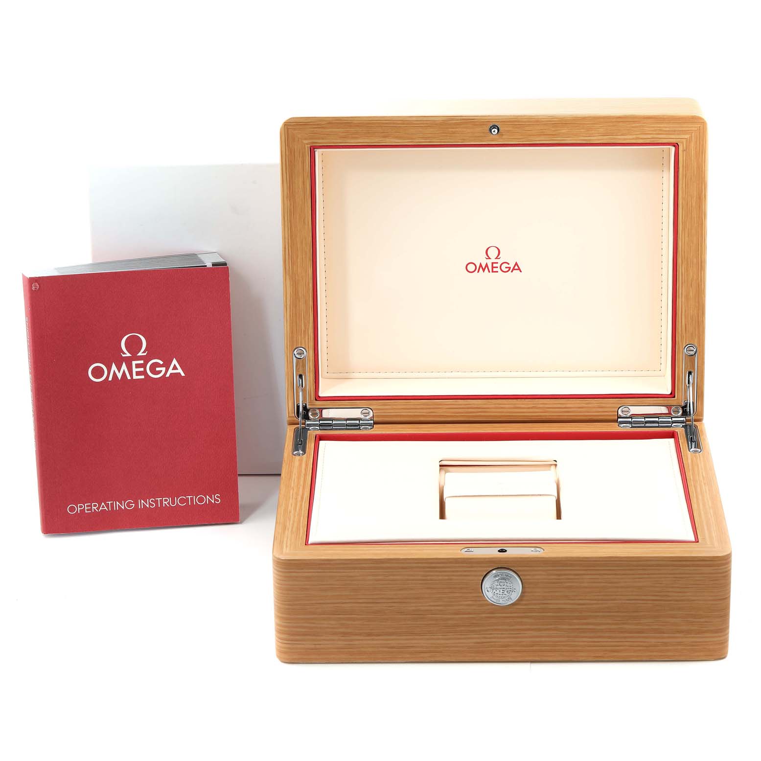 The image shows an open Omega Speedmaster 3651.50.31 Men's Yellow Gold Black Dial 3651.50.31 Men's Yellow Gold Black Dial watch box with operating instructions placed beside it.