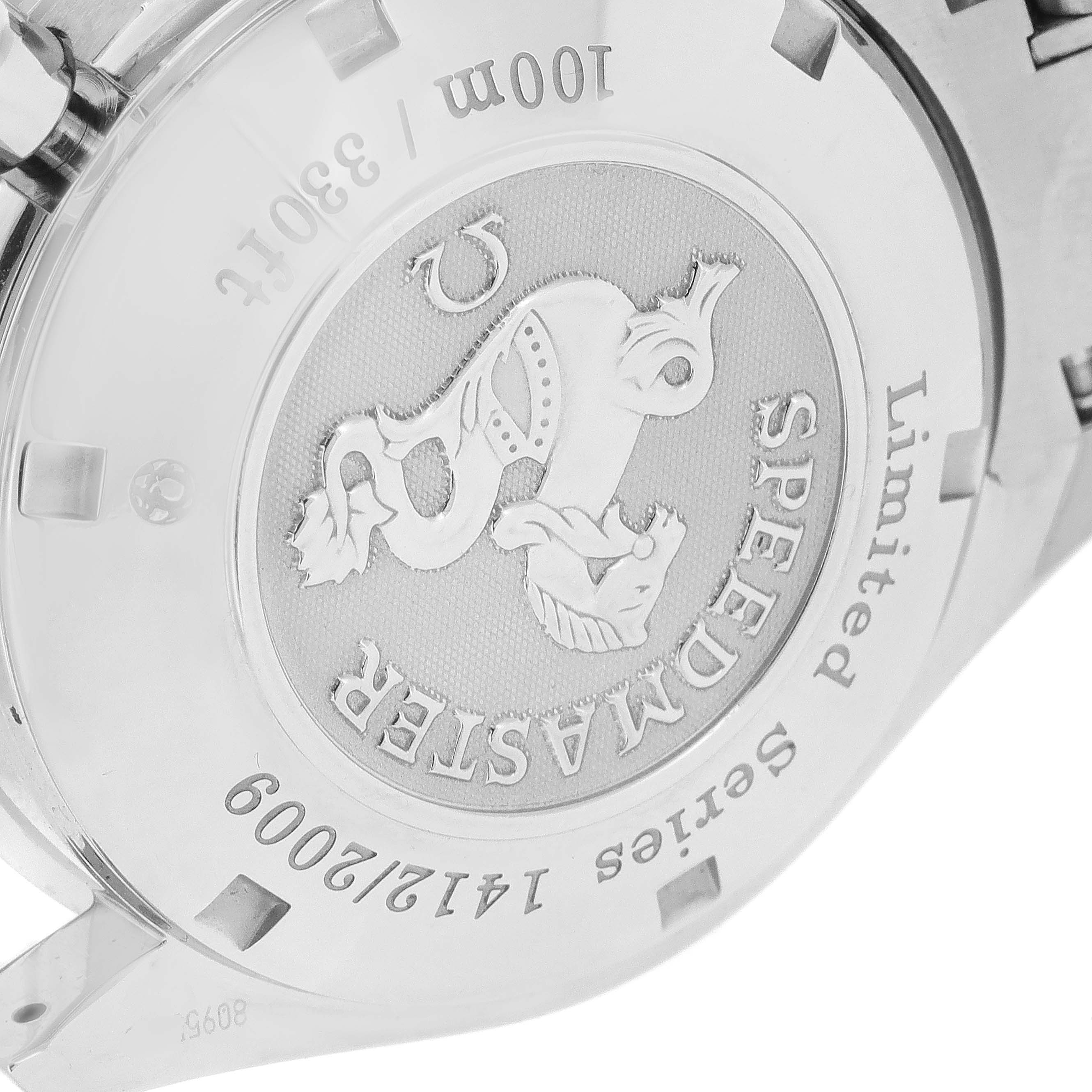 This image shows the case back of an Omega Speedmaster 323.30.40.40.01.001 Men's Stainless Steel Black Dial 323.30.40.40.01.001 Men's Stainless Steel Black Dial watch, highlighting the engraving and series number.