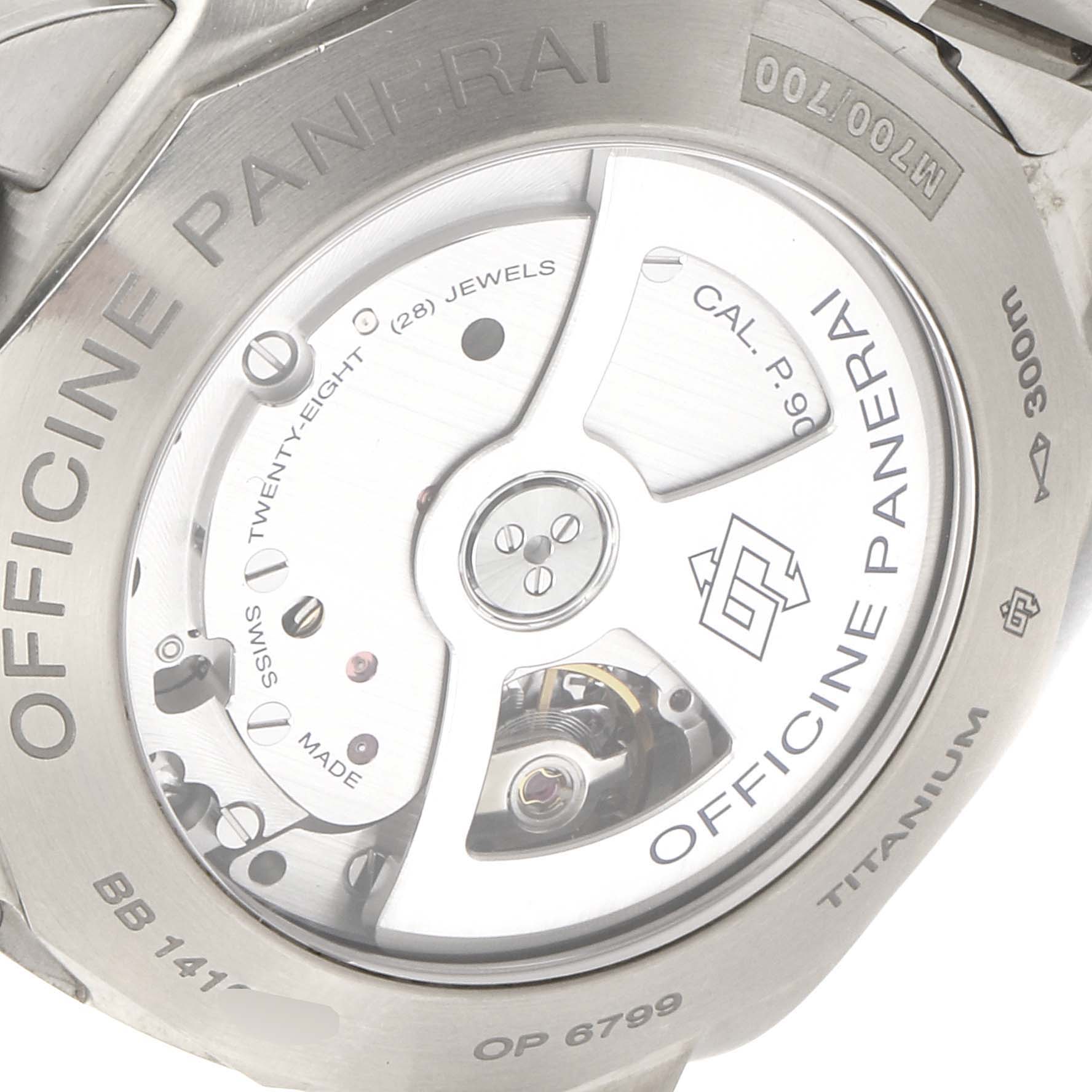The image shows the back view of the Luminor model by Panerai, revealing the movement and inscriptions.