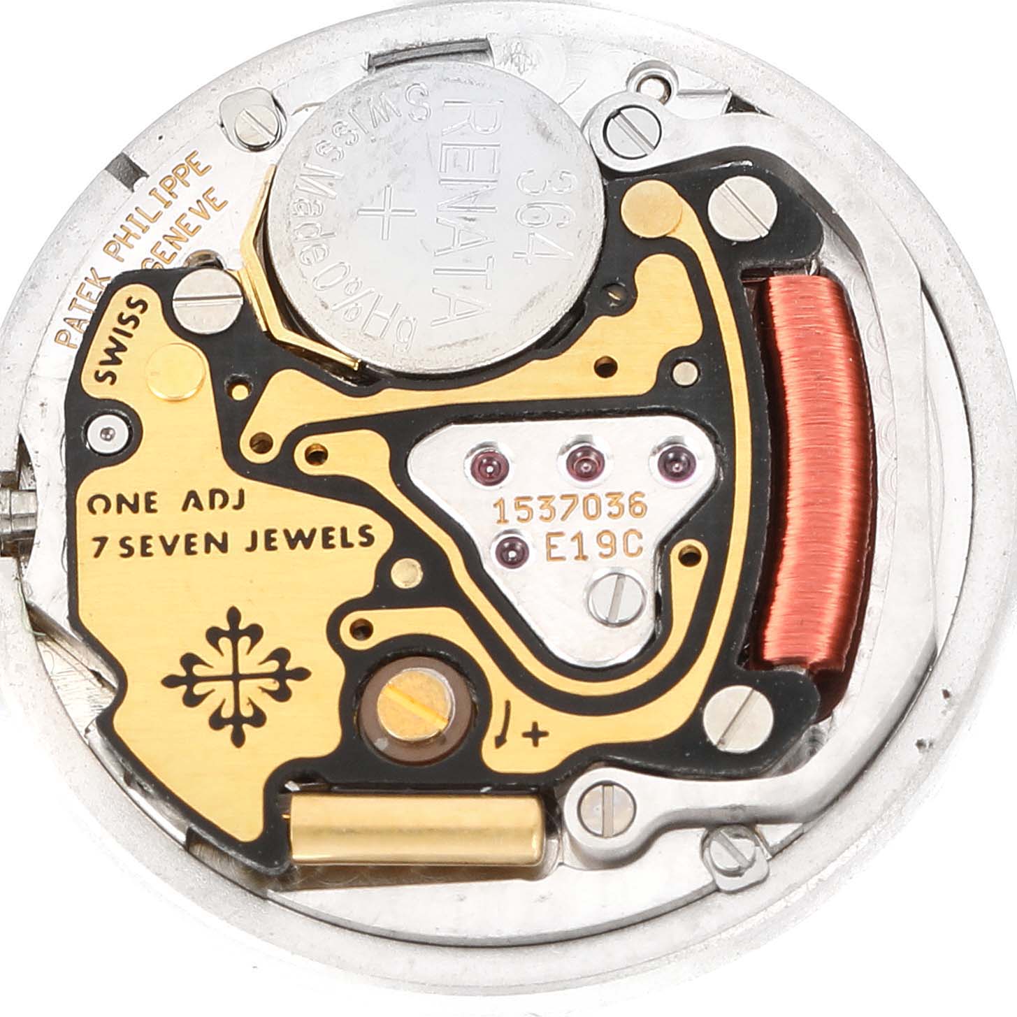 This is a close-up view of the movement mechanism for the Patek Philippe Nautilus 4700/530 Women's Yellow Gold Beige Dial 4700/530 Women's Yellow Gold Beige Dial watch, showing the battery and various internal parts.