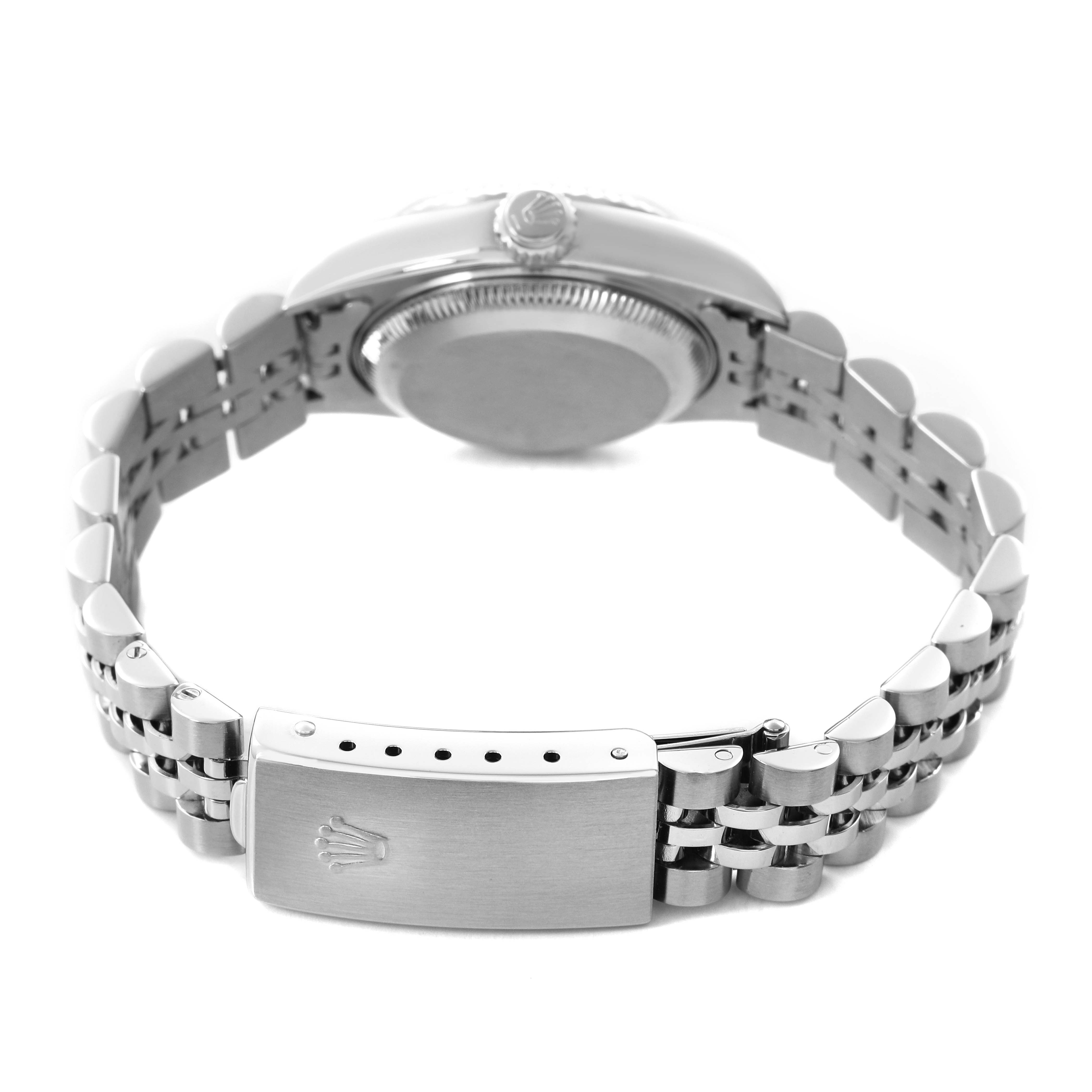 The Rolex Datejust 79174 Women's Stainless Steel Silver Dial watch is shown from the back, highlighting the clasp and bracelet.
