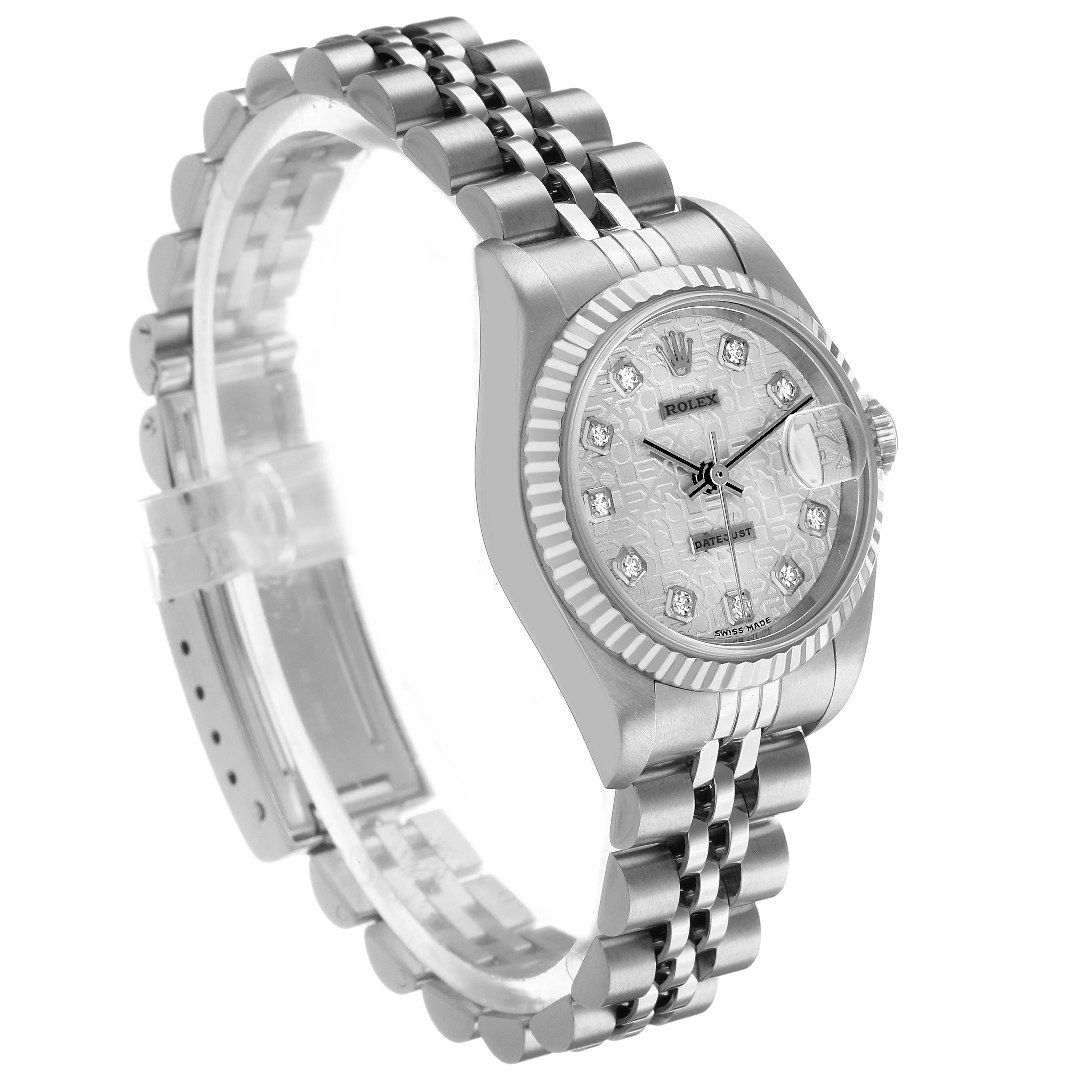 The Rolex Datejust 79174 Women's Stainless Steel Silver Dial watch is shown at a three-quarter angle, highlighting the bracelet, case, and intricate dial.