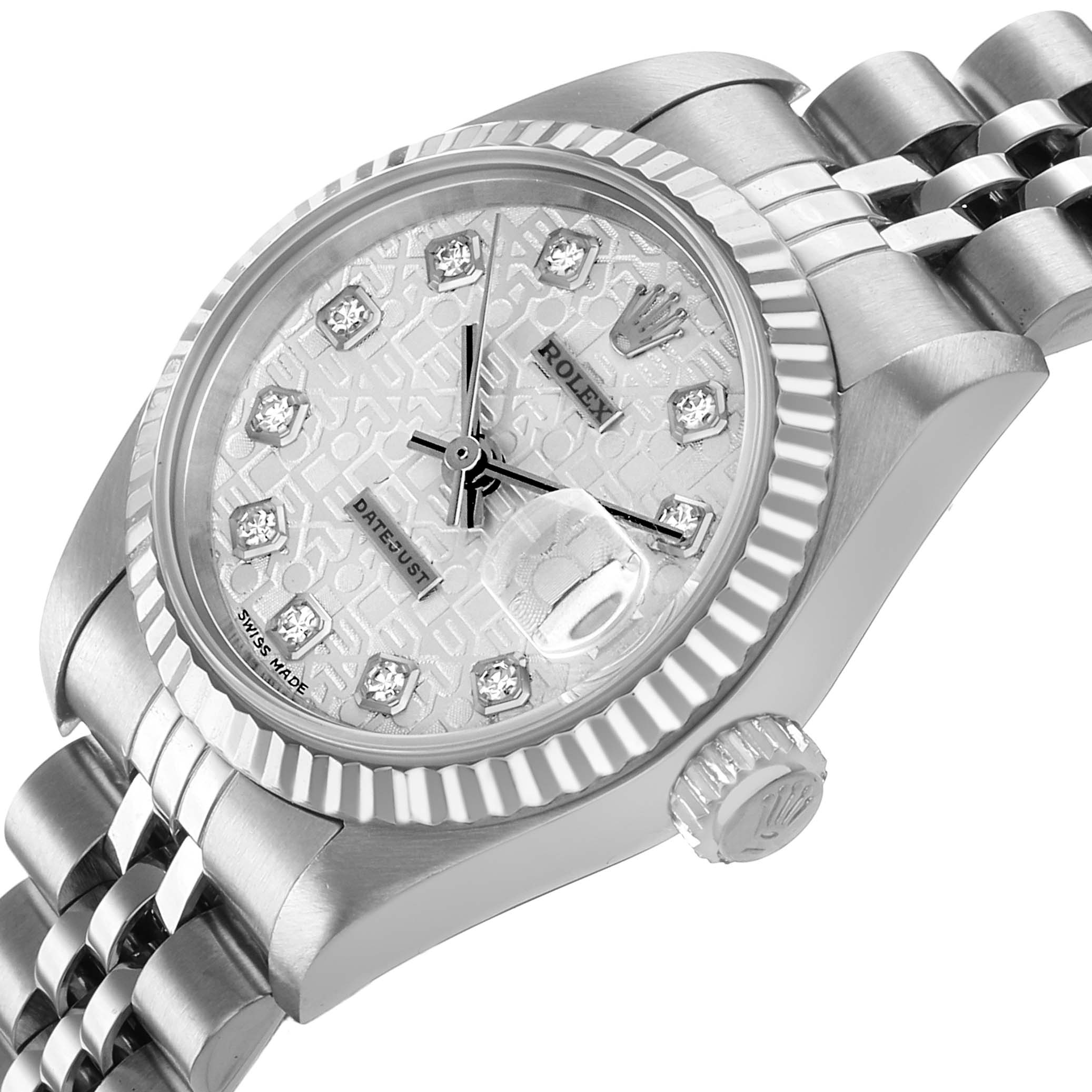 The Rolex Datejust 79174 Women's Stainless Steel Silver Dial watch is shown at an angle highlighting the face, bezel, crown, and part of the bracelet.
