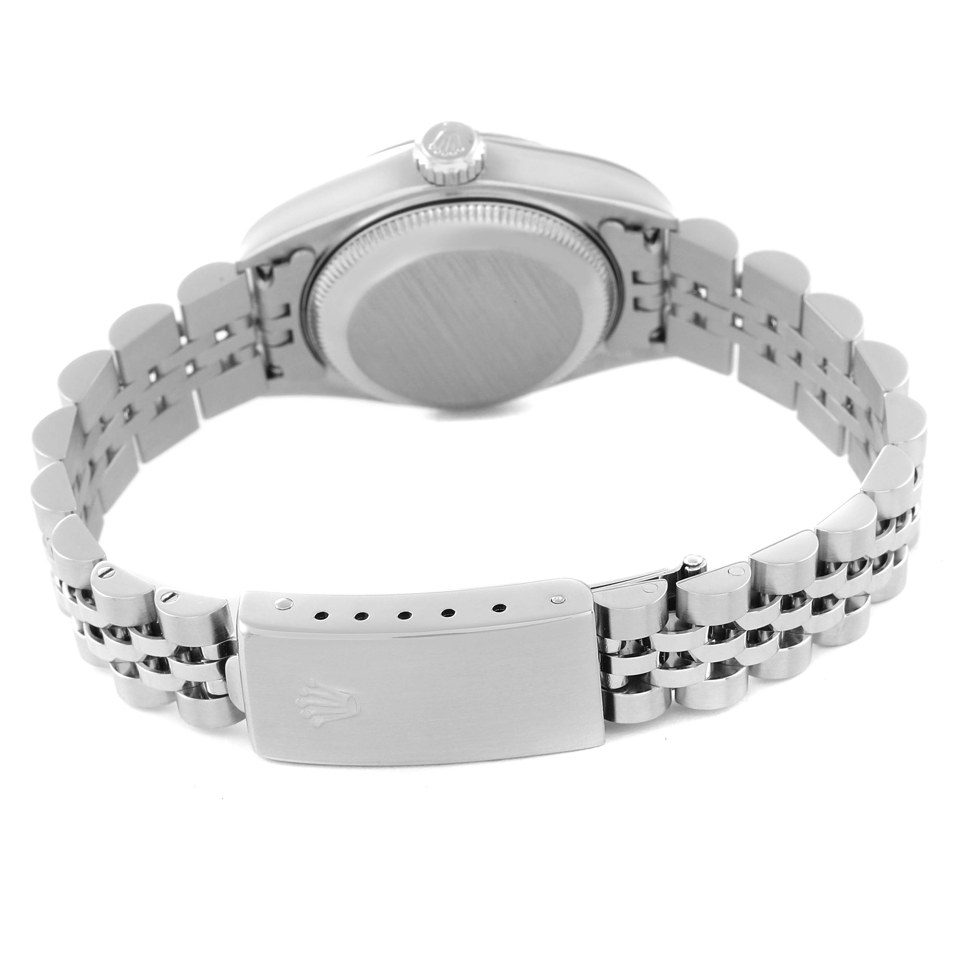 The image shows the back view of a Rolex Datejust 79174 Women's Stainless Steel Silver Dial 79174 Women's Stainless Steel Silver Dial watch, highlighting the case back, crown, and the bracelet clasp.