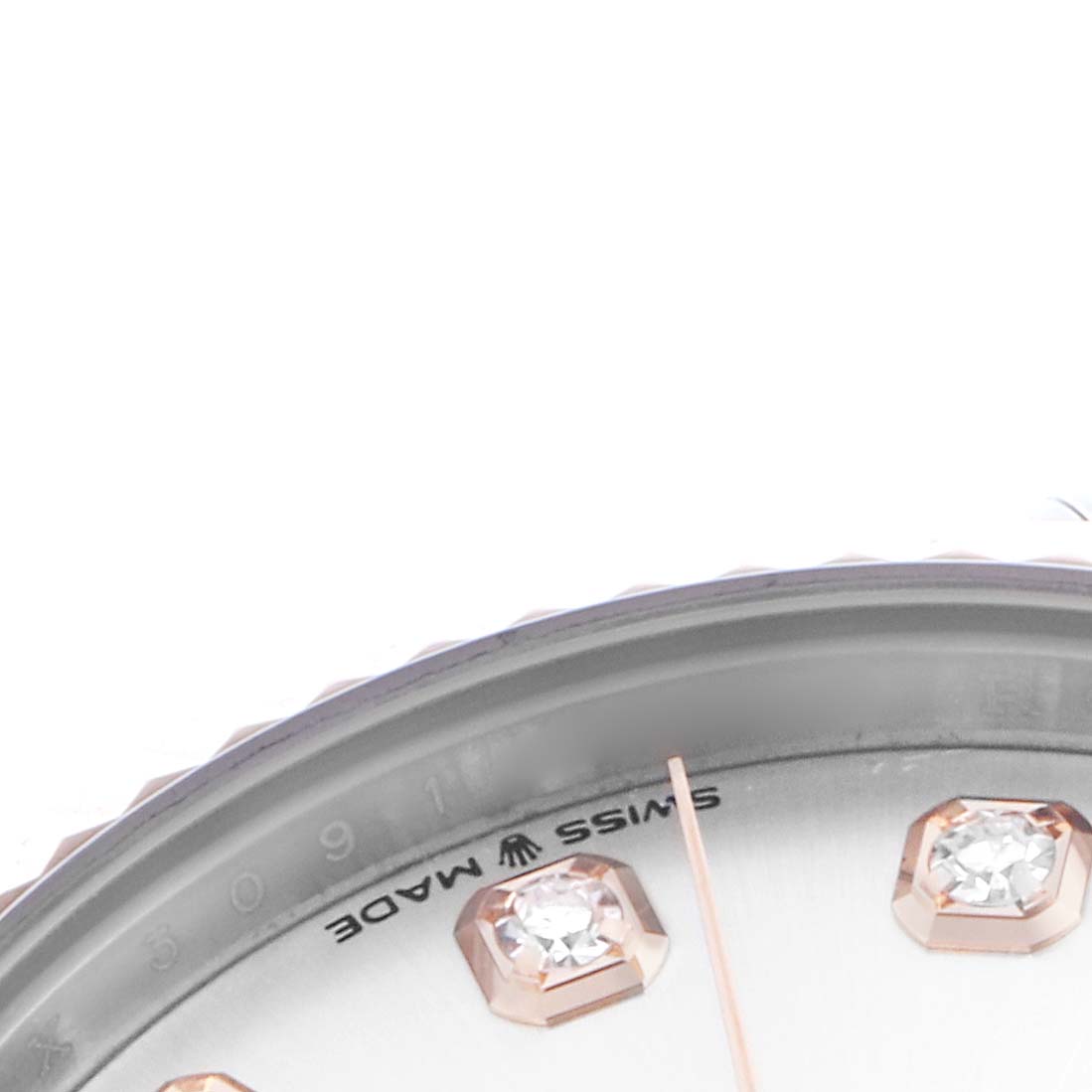 The image shows a close-up of a Rolex Mid-Size 278271 Women's Steel and Gold (two tone) Silver Dial 278271 Women's Steel and Gold (two tone) Silver Dial watch, focusing on the bezel and part of the dial with diamond markers.