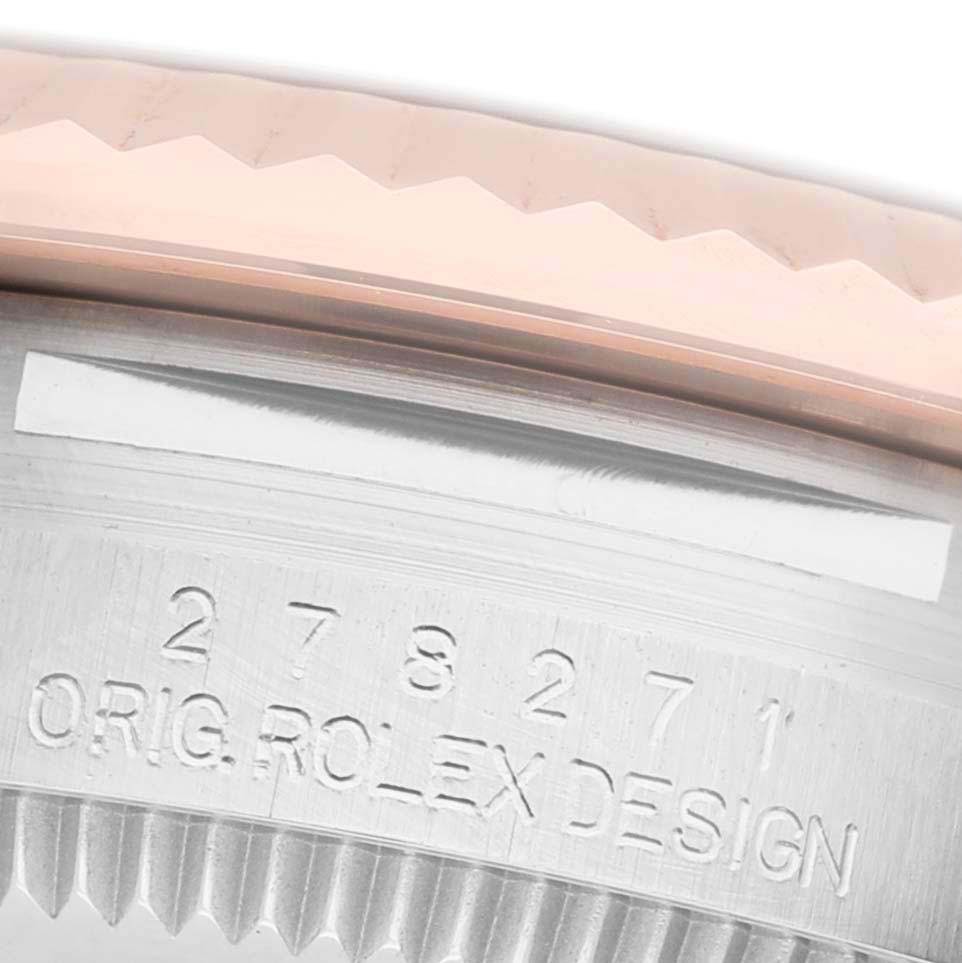 The image shows a close-up of the side engraving of a Mid-Size Rolex watch case, highlighting the model number.