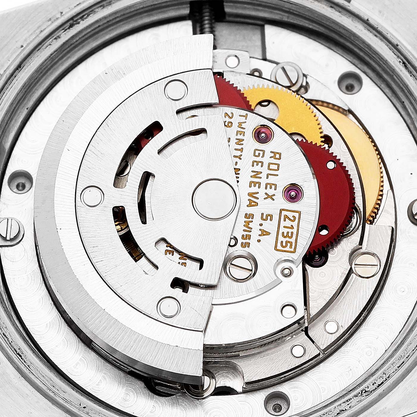 This image shows the internal mechanism of a Rolex Datejust 68273 Men's Stainless Steel White Dial watch, focusing on the rotor and gear components.