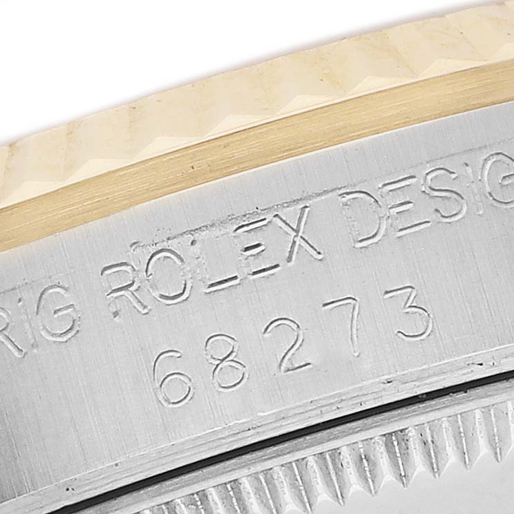 The image shows a close-up of the model number engraving on the side of the Rolex Datejust 68273 Men's Stainless Steel White Dial's case, near the bezel.