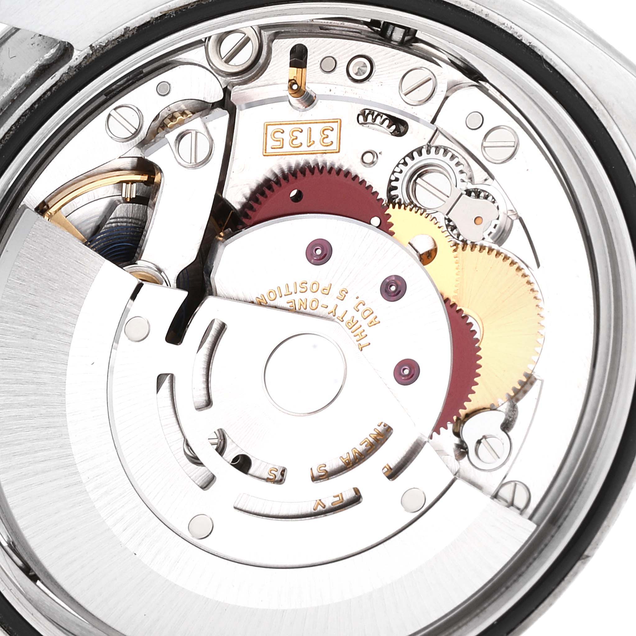 This is a close-up view of the internal mechanism of a Rolex Datejust 116200 Men's Stainless Steel Silver Dial 116200 Men's Stainless Steel Silver Dial watch, showing gears and intricate parts.