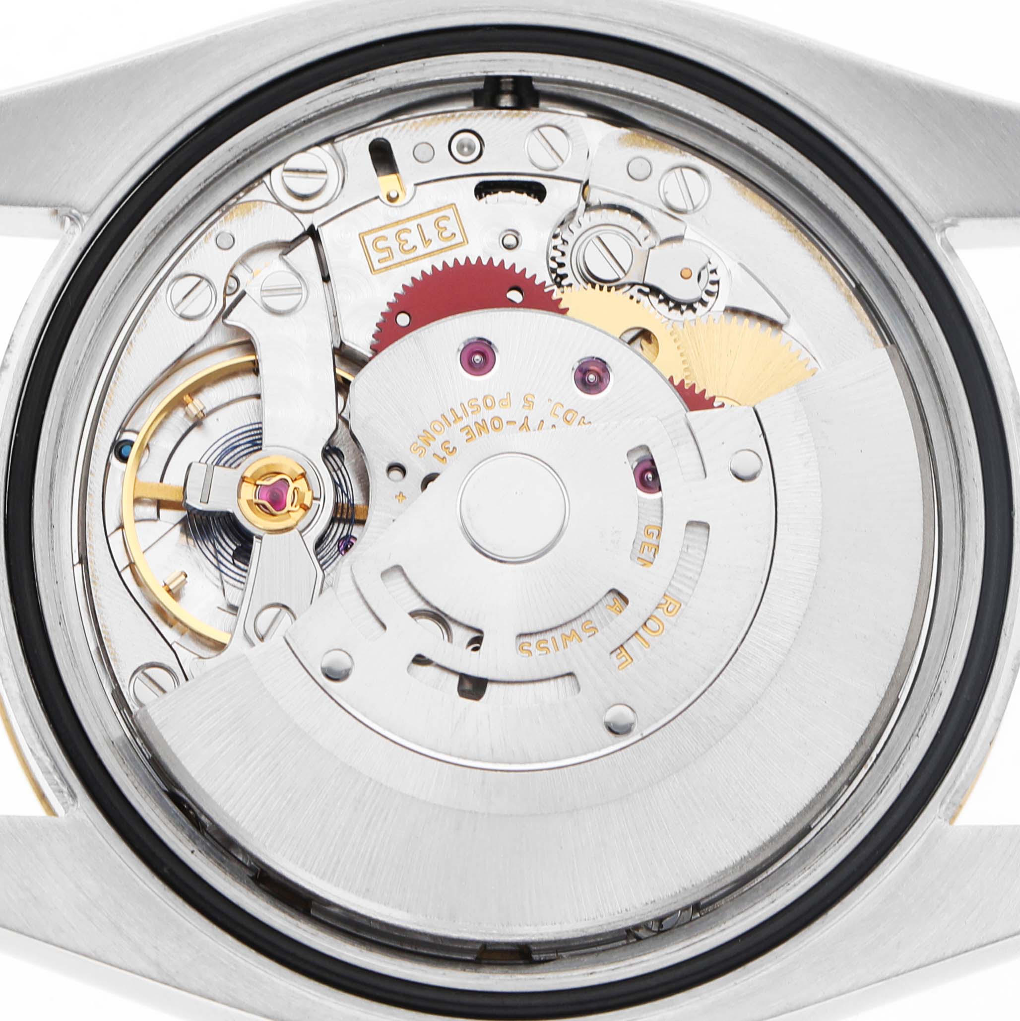 The image shows the movement of a Rolex Datejust 116233 Men's Stainless Steel Champagne Dial watch from the back, highlighting the intricate gears and rotor.