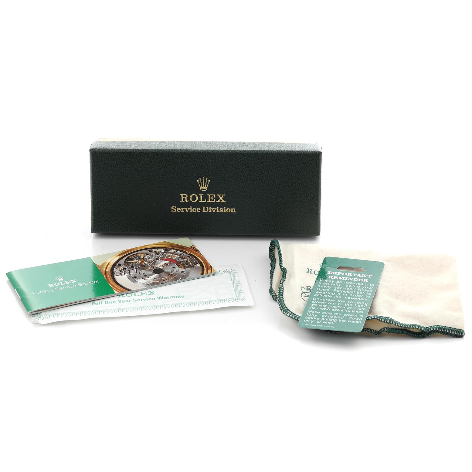 The image shows a green Rolex Datejust 16233 Men's Steel and Gold (two tone) Champagne Dial 16233 Men's Steel and Gold (two tone) Champagne Dial service box, booklets, a warranty card, a cloth, and a reminder card.