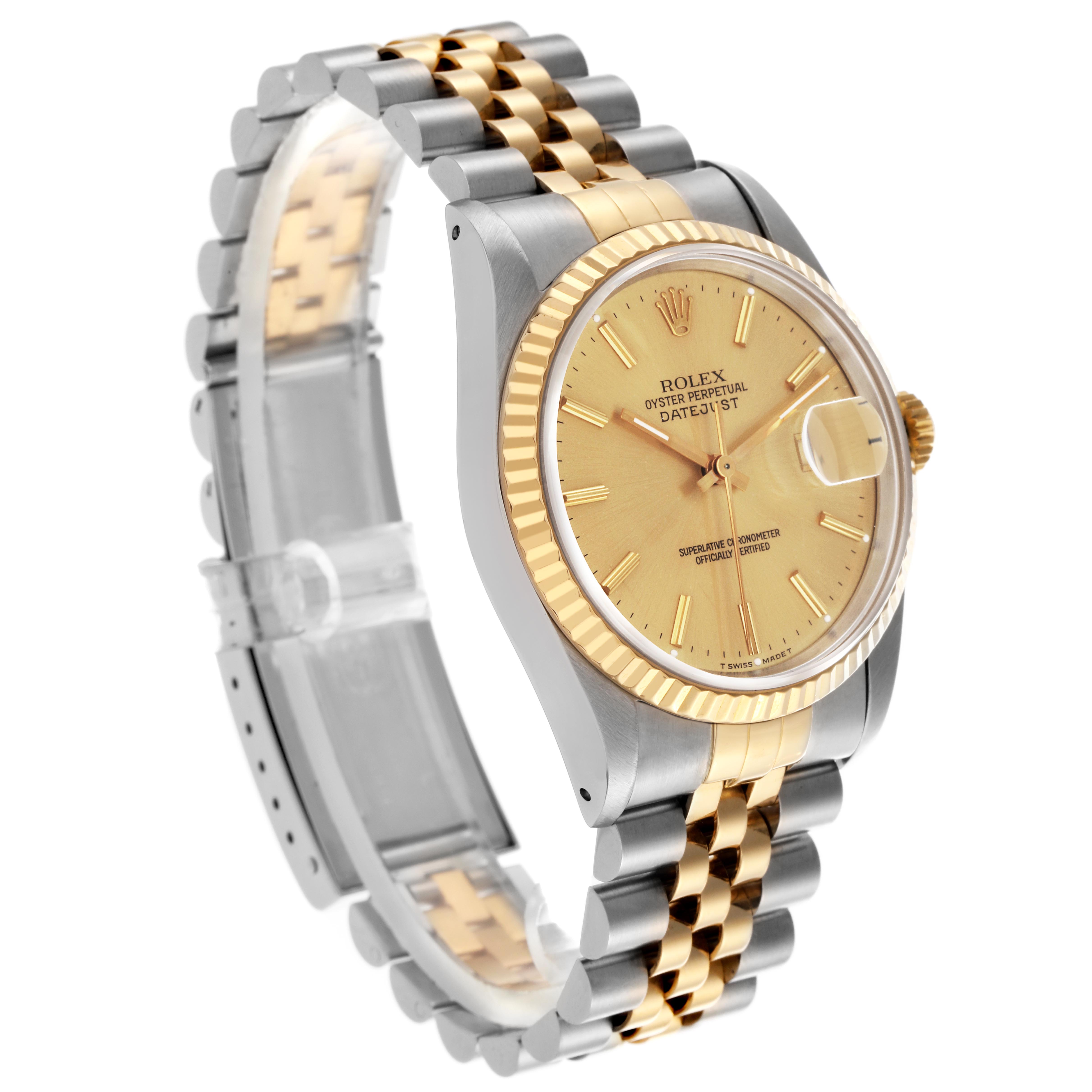 The Rolex Datejust 16233 Men's Steel and Gold (two tone) Champagne Dial 16233 Men's Steel and Gold (two tone) Champagne Dial watch is shown at a three-quarter angle, highlighting its gold dial, fluted bezel, and two-tone bracelet.