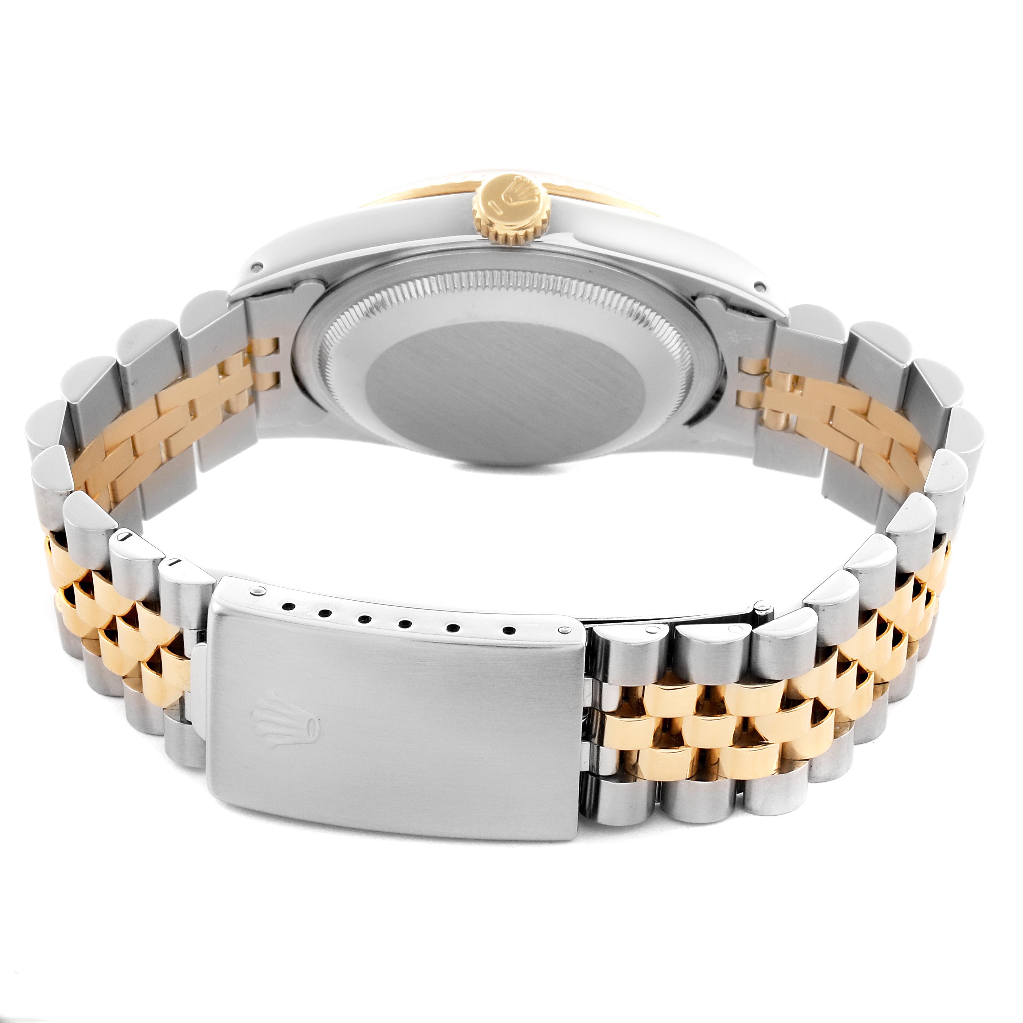 The image shows the back view of a Rolex Datejust 16233 Men's Steel and Gold (two tone) Champagne Dial 16233 Men's Steel and Gold (two tone) Champagne Dial, highlighting the clasp, bracelet, and case back.