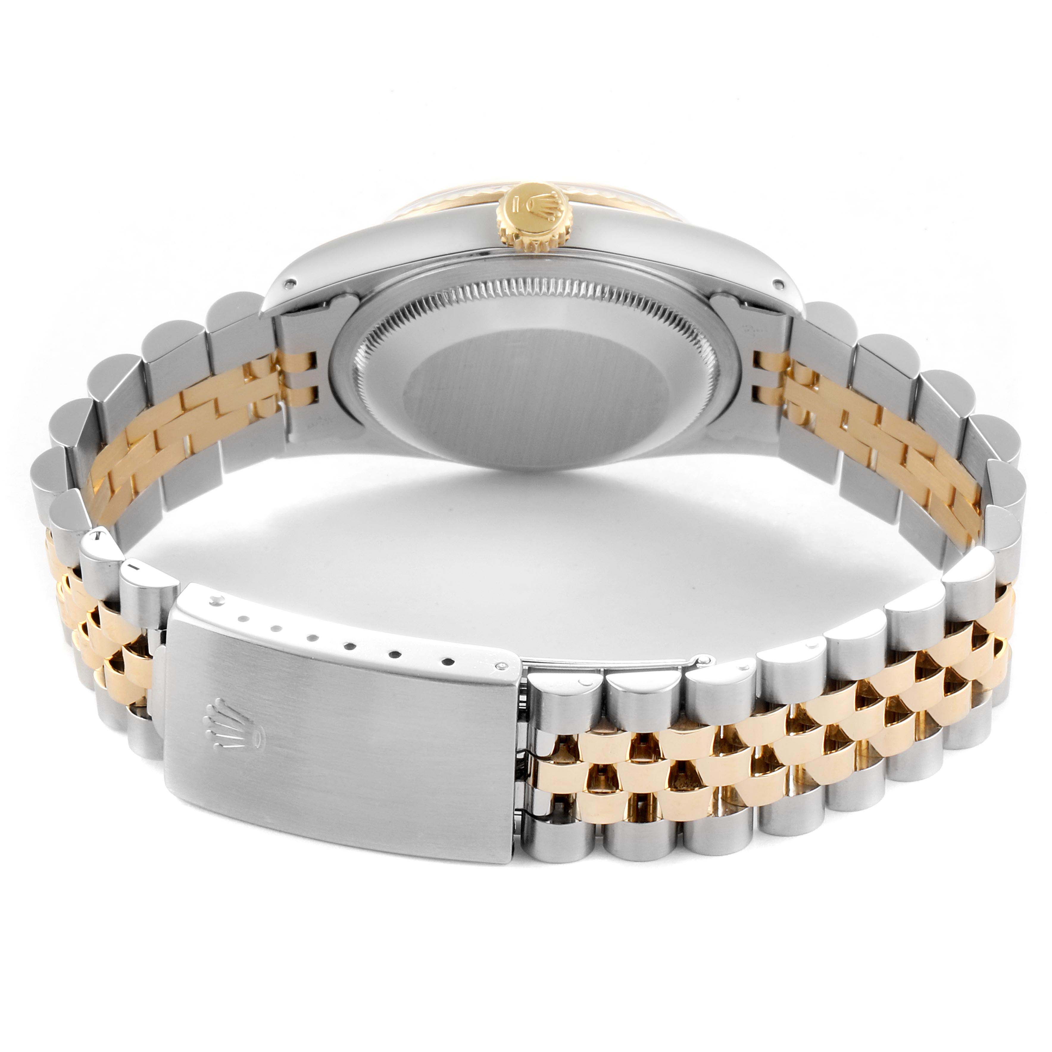 The image shows the back of a Rolex Datejust 16233 Men
s Steel and Gold (two tone) White Dial 16233 Men
s Steel and Gold (two tone) White Dial watch, highlighting the bracelet, clasp, case back, and crown.