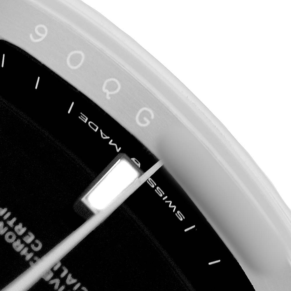 The image shows a close-up of the dial edge and hand of a Rolex Datejust 41 M126334-0018 Men's Stainless Steel Black Dial, focusing on the "Swiss Made" text.