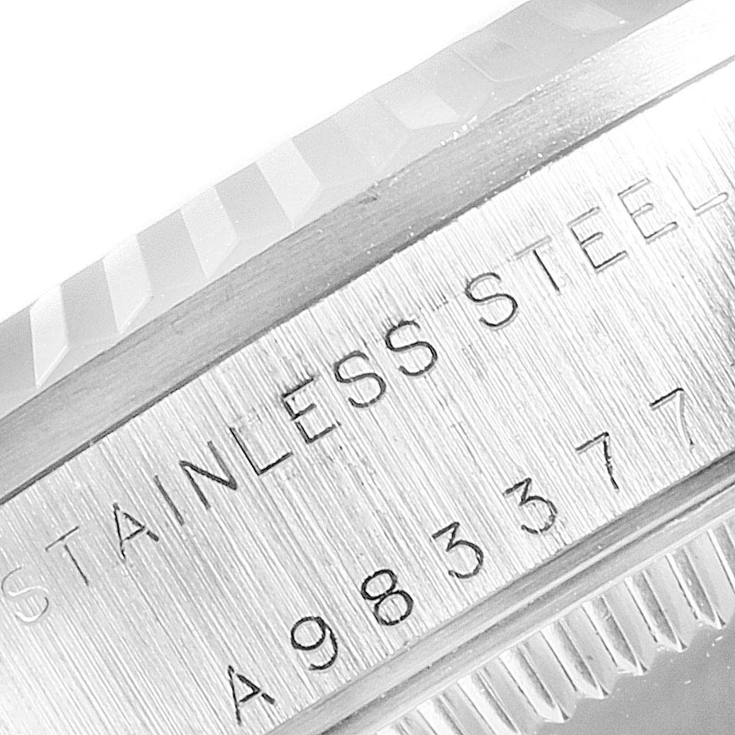 This image shows a close-up of the stainless steel caseback of a Rolex Mid-Size 78274 Women
s Stainless Steel Silver Dial 78274 Women
s Stainless Steel Silver Dial watch with serial number engraving.
