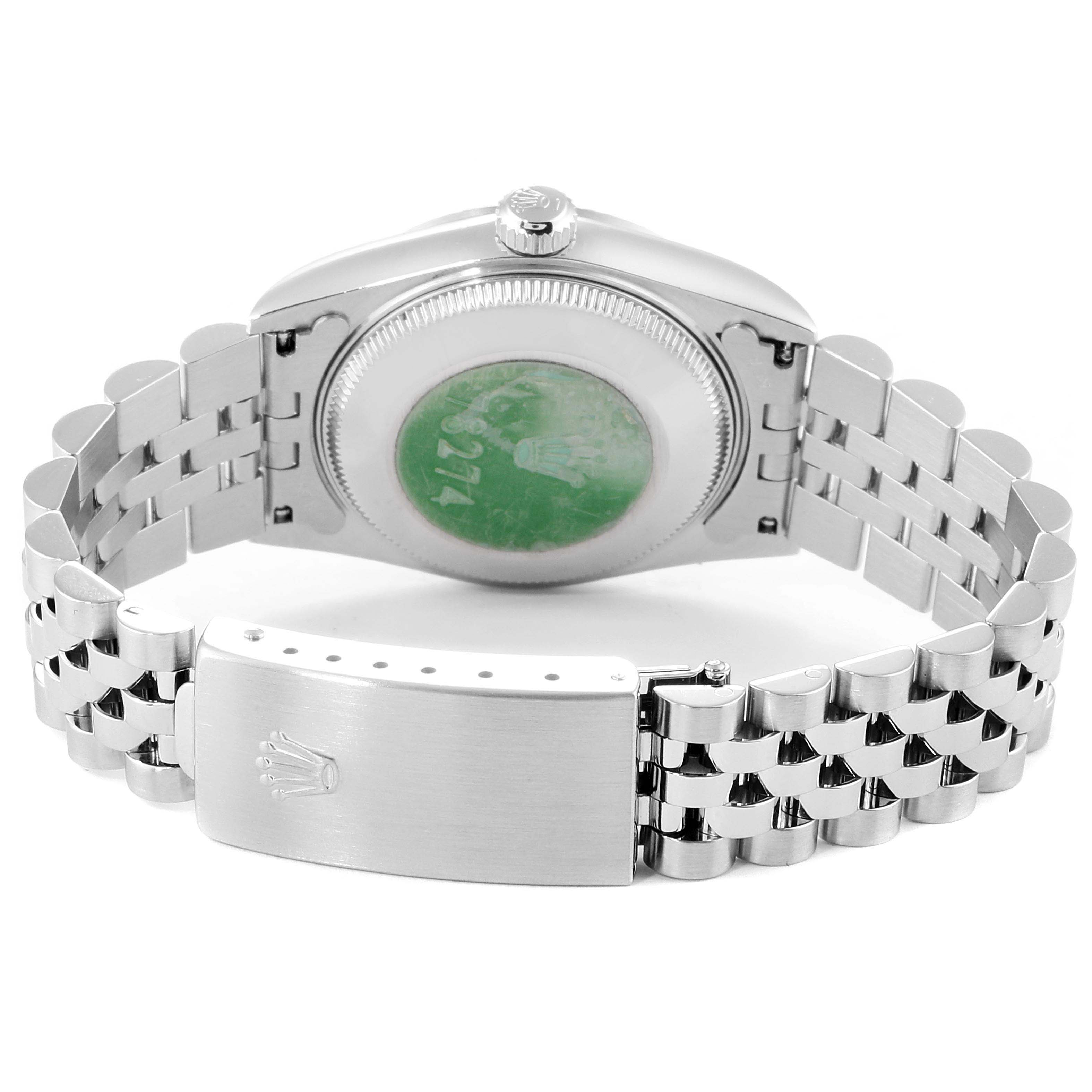 This image shows the case back and bracelet of a Mid-Size Rolex watch from an angled rear view.