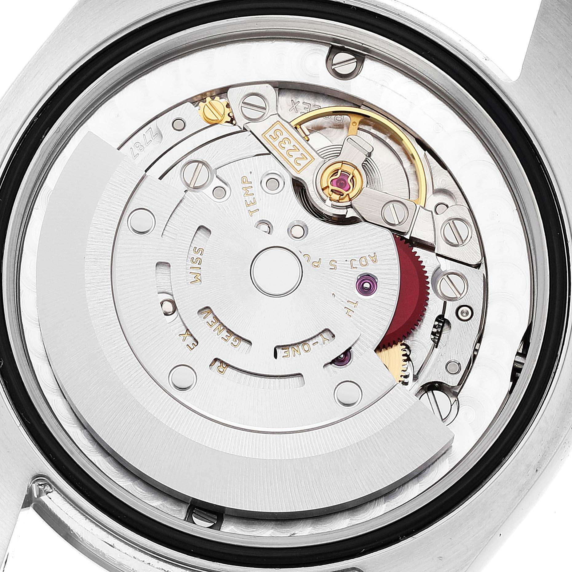 The image shows the internal mechanical movement of a Mid-Size Rolex watch from the back.