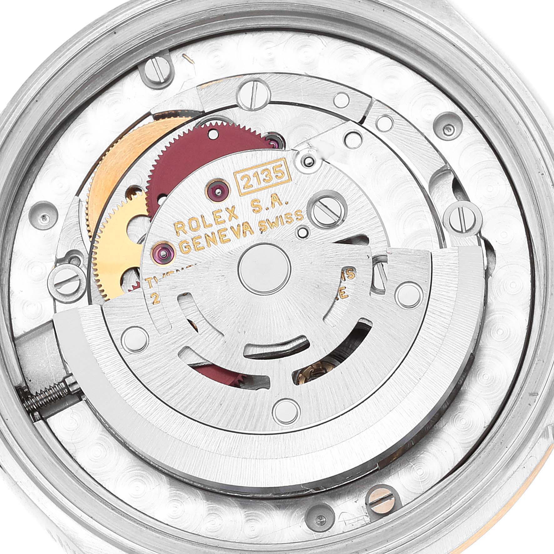 The image shows the movement mechanism of a Rolex Mid-Size 68273 Women
s Steel and Gold (two tone) Champagne Dial 68273 Women
s Steel and Gold (two tone) Champagne Dial watch, specifically the rotor and gears from a top-down perspective.