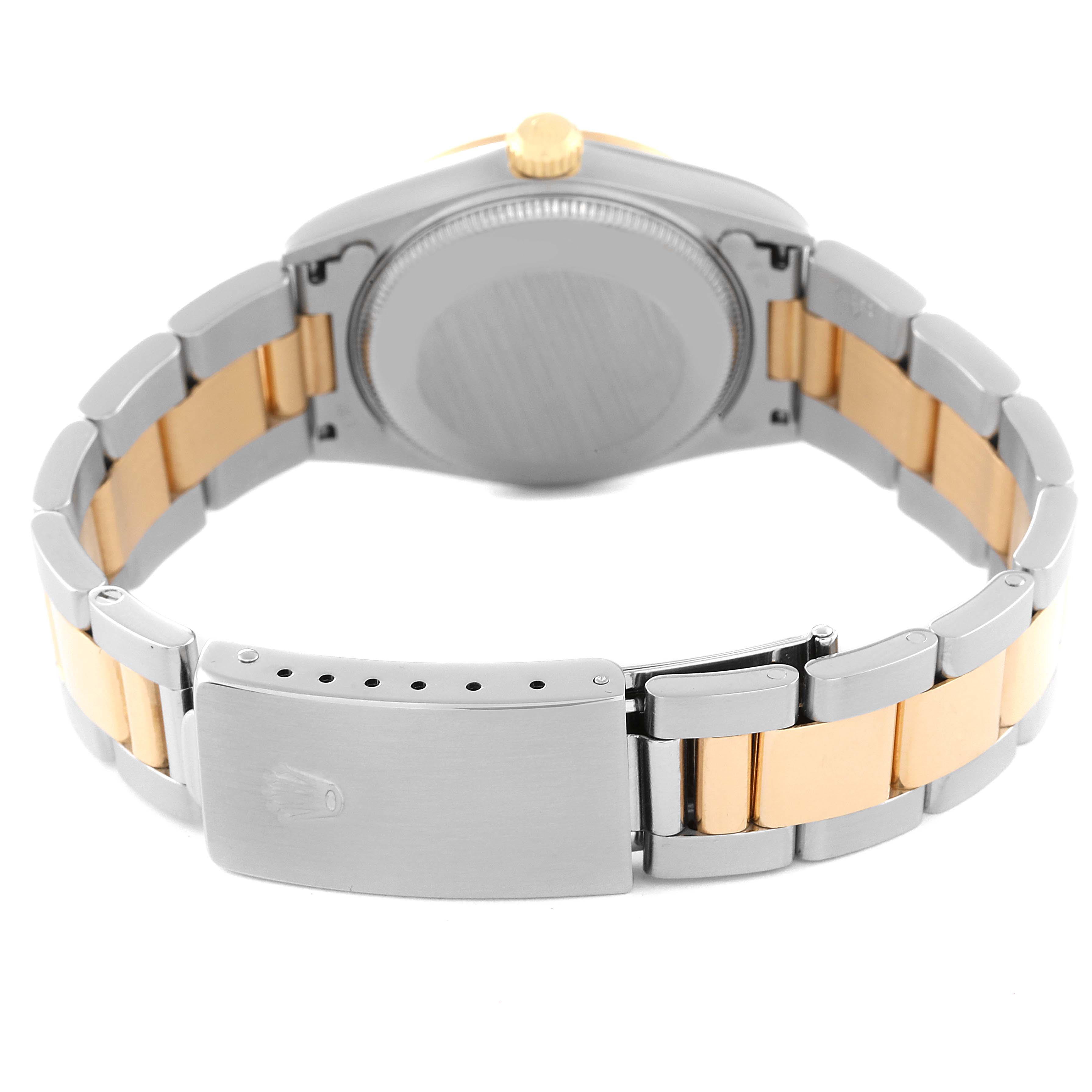 This image shows the back case and bracelet of a Rolex Mid-Size 68273 Women
s Steel and Gold (two tone) White Dial 68273 Women
s Steel and Gold (two tone) White Dial watch from a rear angle.