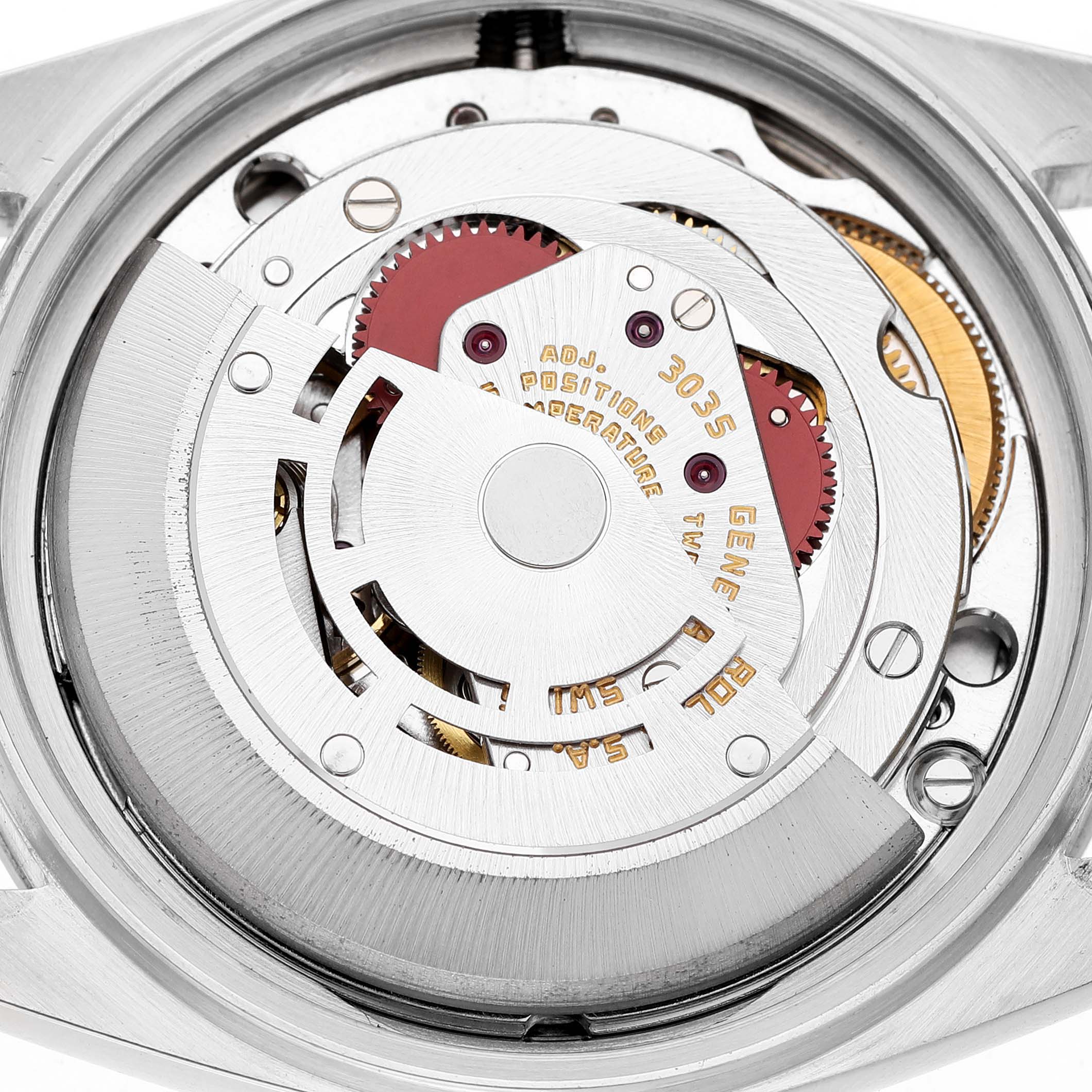 The image shows the movement of a Rolex Datejust 16030 Men's Stainless Steel Silver Dial, highlighting gears and the rotor.