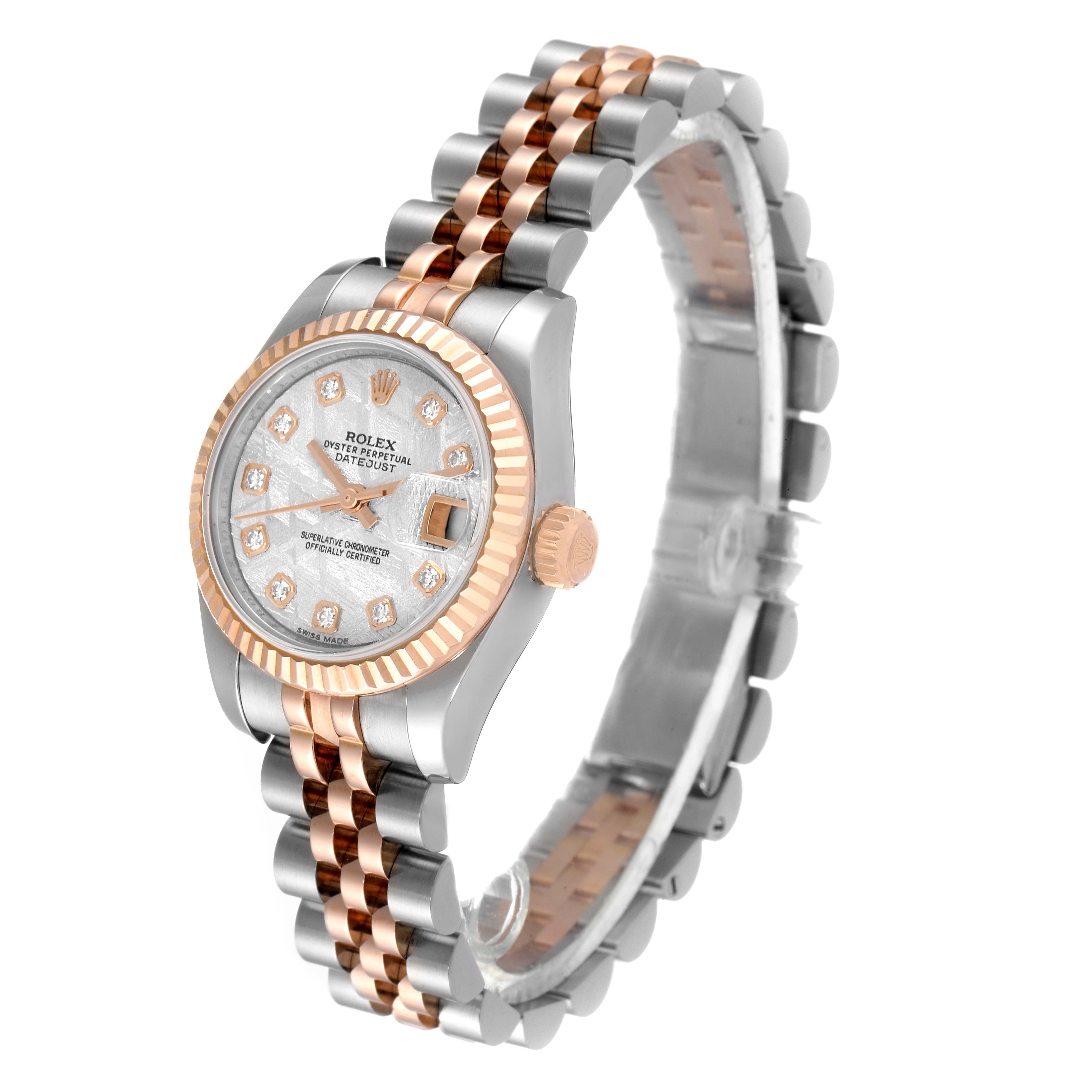 The image shows a Rolex Datejust 179171 Women's Steel and Gold (two tone) Silver Dial 179171 Women's Steel and Gold (two tone) Silver Dial watch at an angle showcasing its face, bezel, crown, and bracelet.