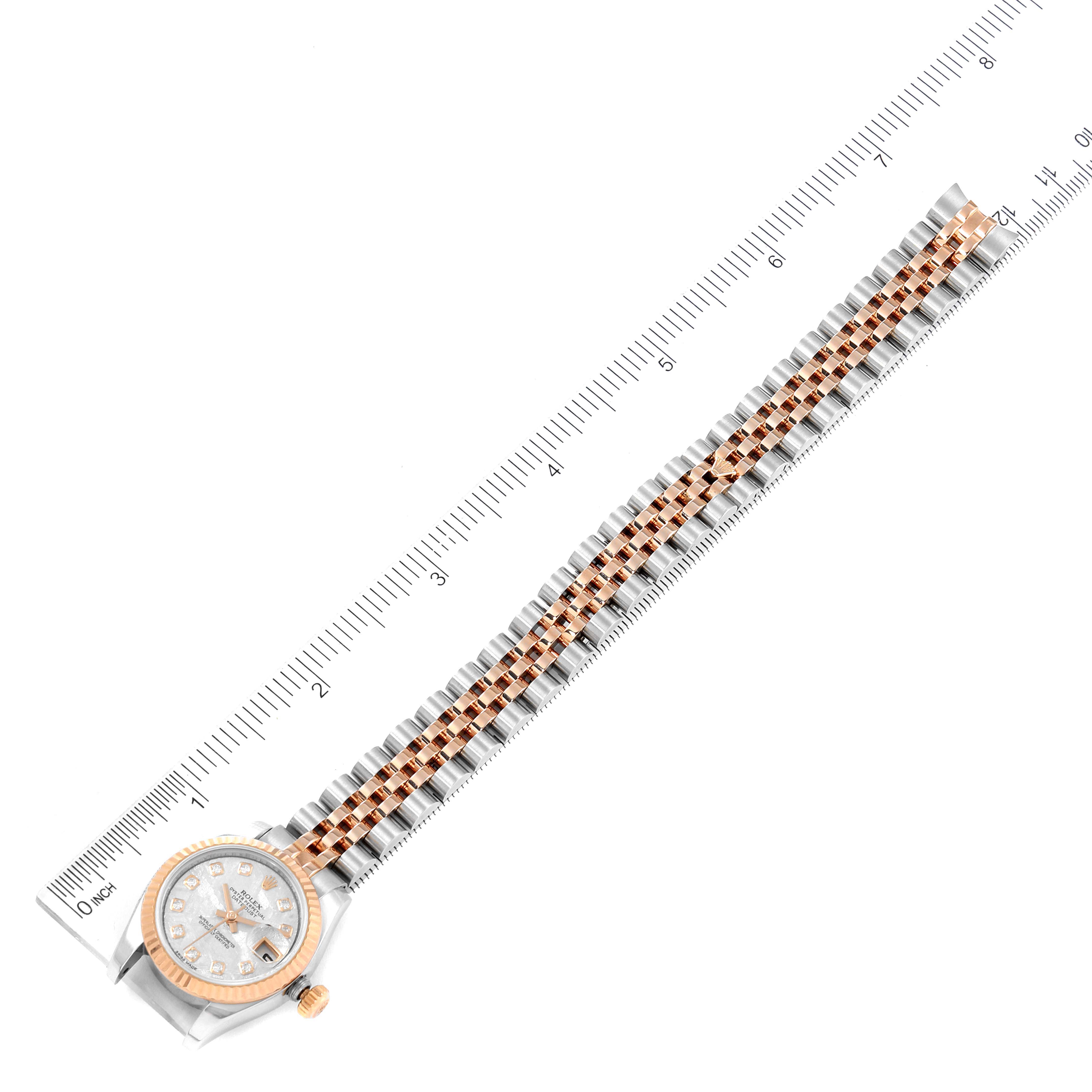 The image shows a top-down view of a Rolex Datejust 179171 Women's Steel and Gold (two tone) Silver Dial 179171 Women's Steel and Gold (two tone) Silver Dial watch, showcasing the face and the full length of the two-tone bracelet.