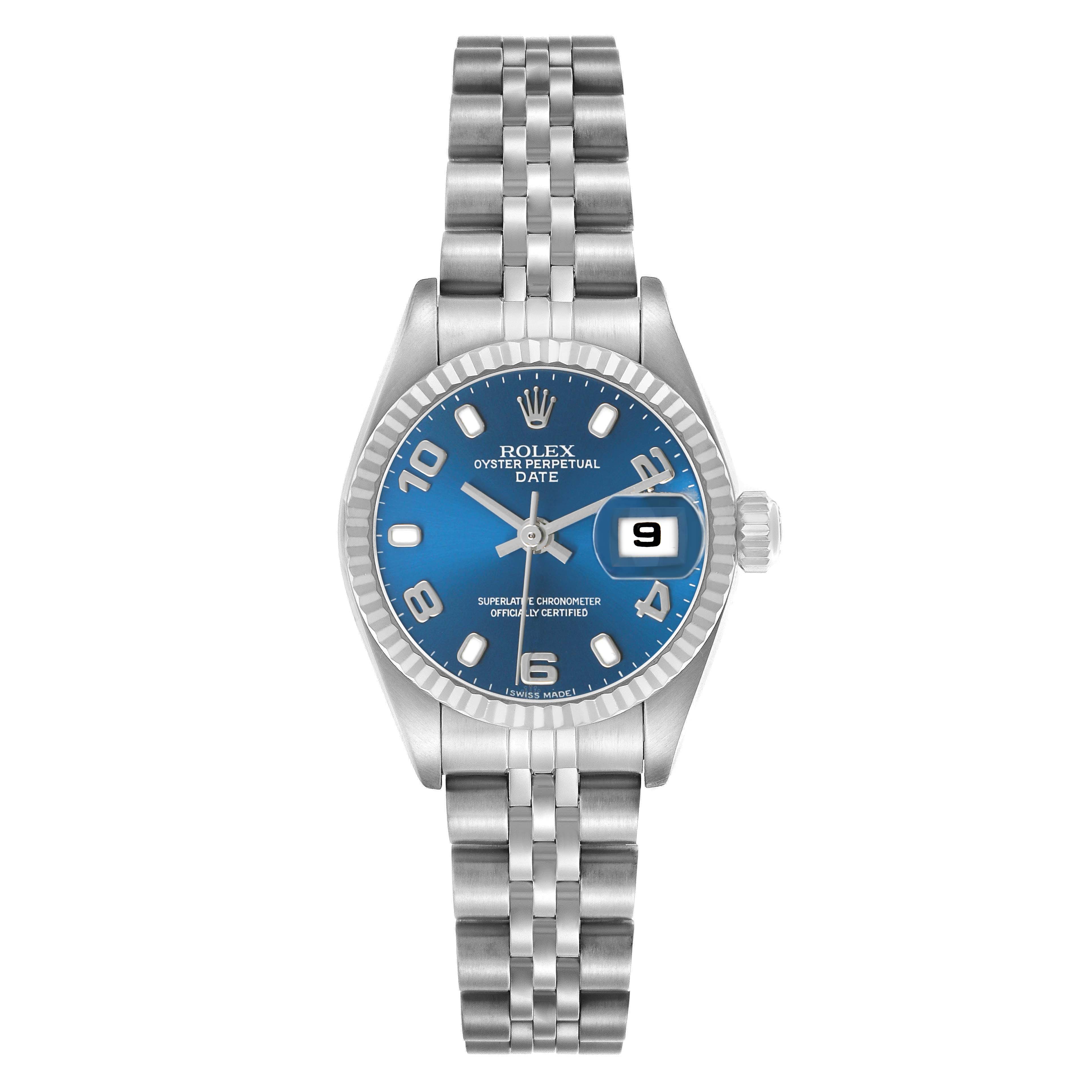 The Rolex Datejust 79174 Women's Stainless Steel Blue Dial watch is shown from a front angle, displaying its blue dial, date window, bezel, and bracelet.