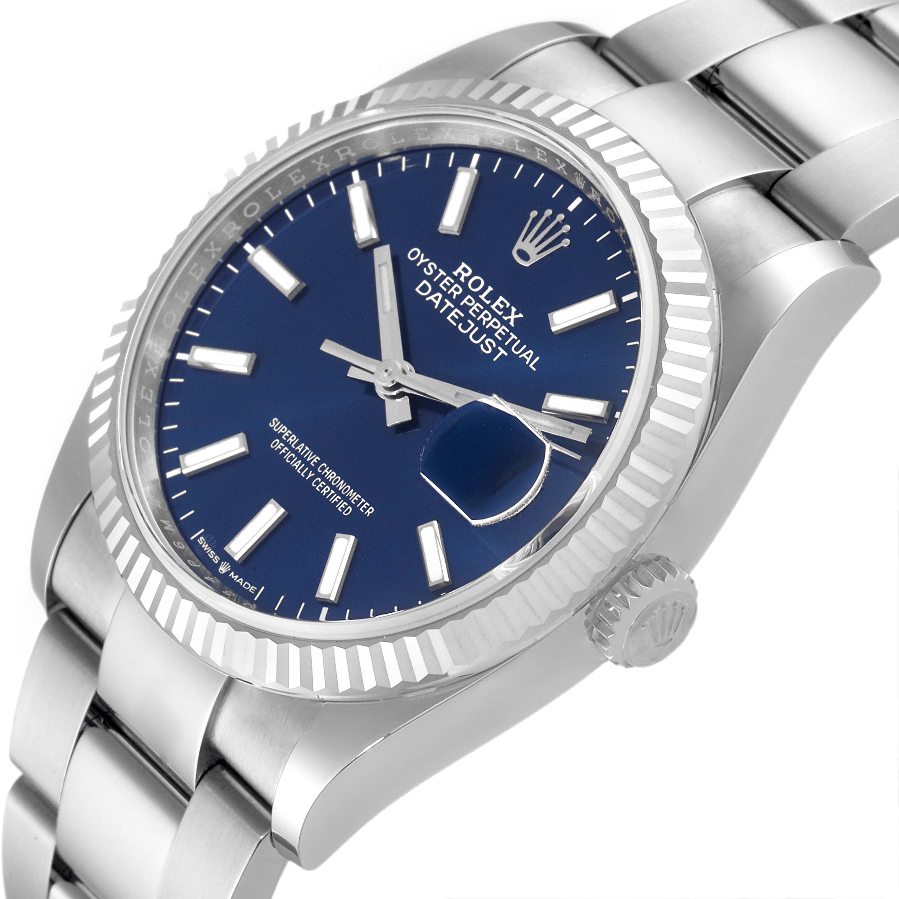The image shows a Rolex Datejust 126234 Men's Stainless Steel Blue Dial 126234 Men's Stainless Steel Blue Dial watch at a slight angle, highlighting the face, bezel, and part of the bracelet.