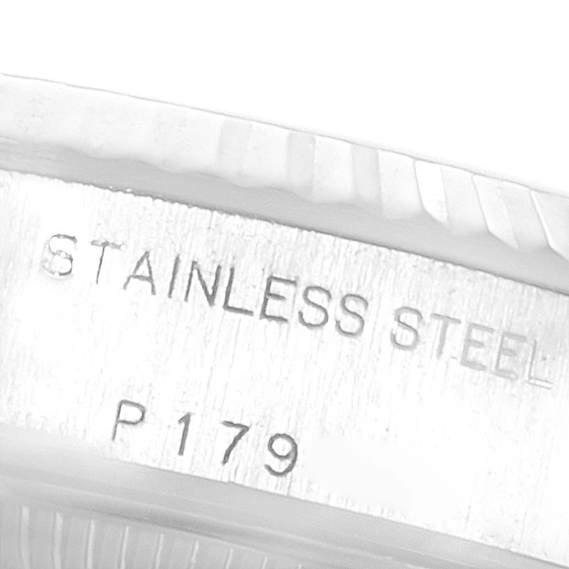 The image shows a close-up of the stainless steel marking and model number inside the case of a Rolex Datejust 79174 Women's Stainless Steel Mother of Pearl Dial 79174 Women's Stainless Steel Mother of Pearl Dial watch.